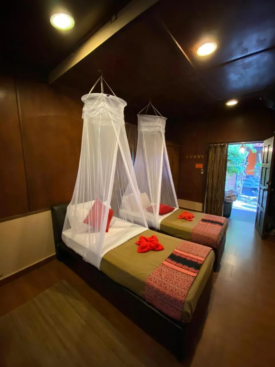 Bed in Ombak Dive Resort Perhentian Island