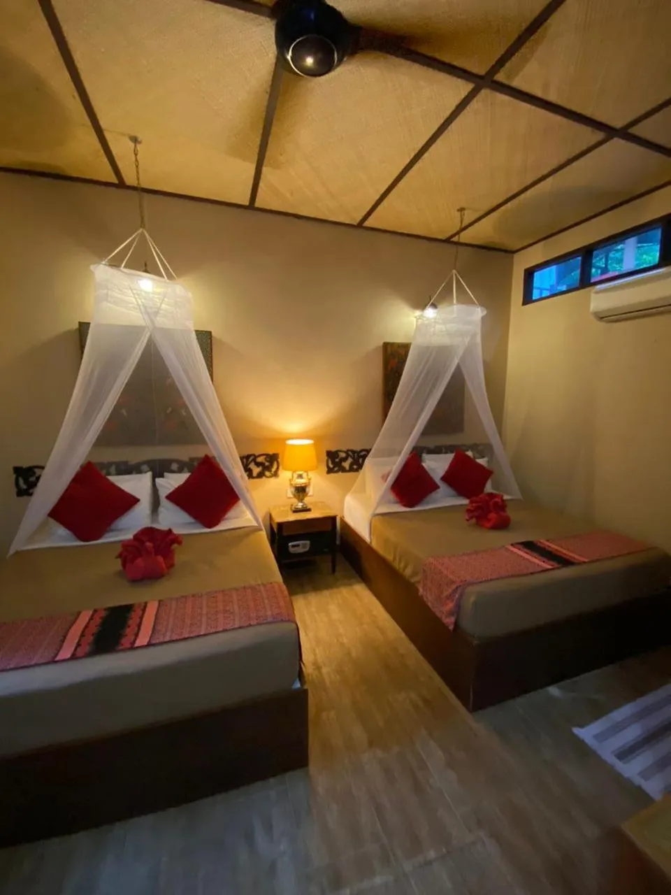 Bed in Ombak Dive Resort Perhentian Island