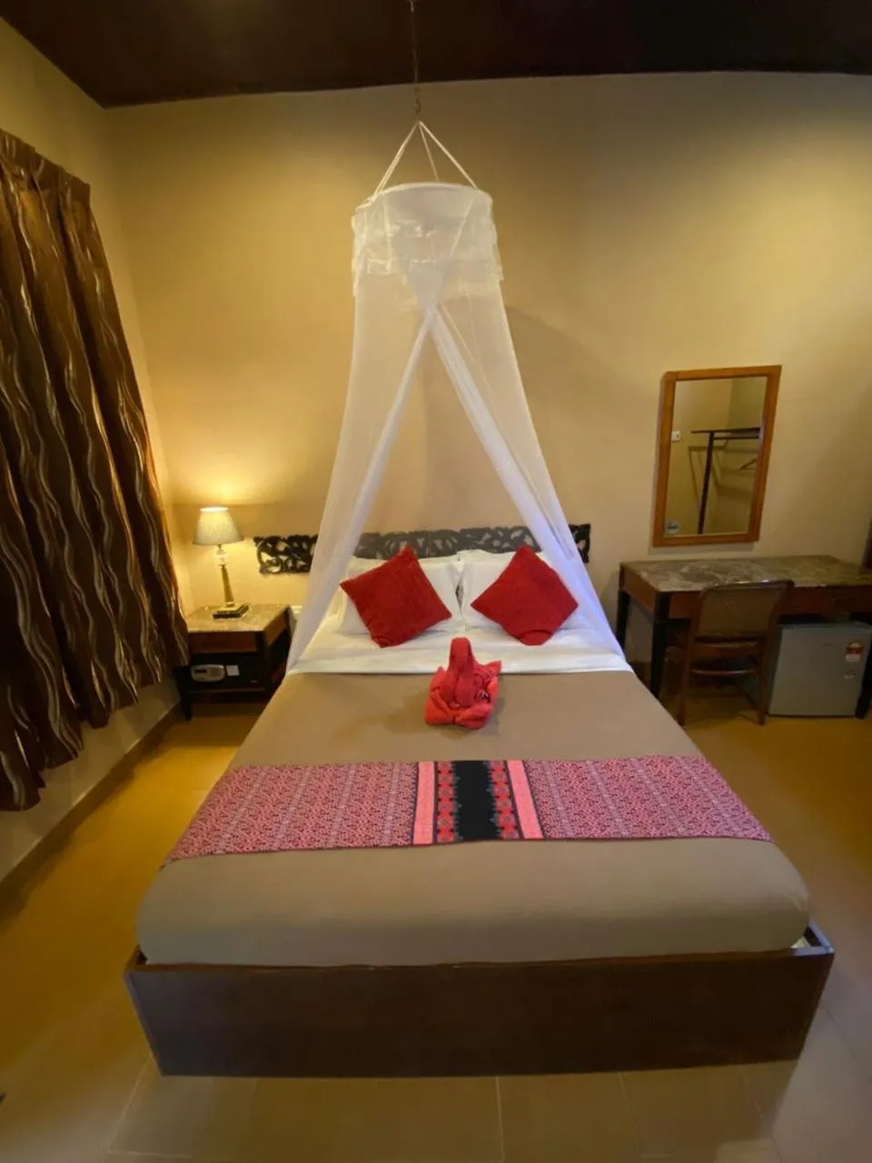 Bed in Ombak Dive Resort Perhentian Island