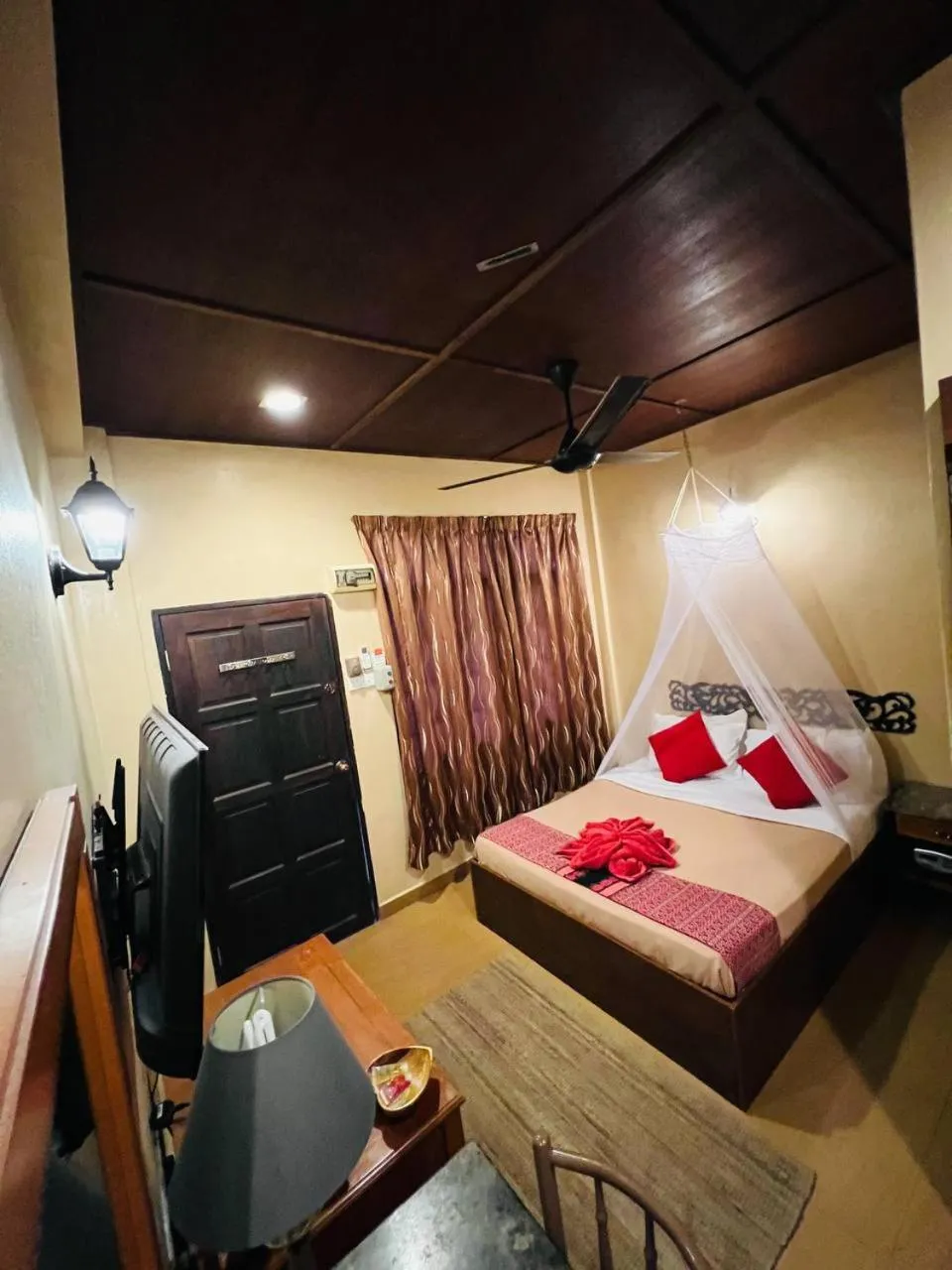 Bed in Ombak Dive Resort Perhentian Island