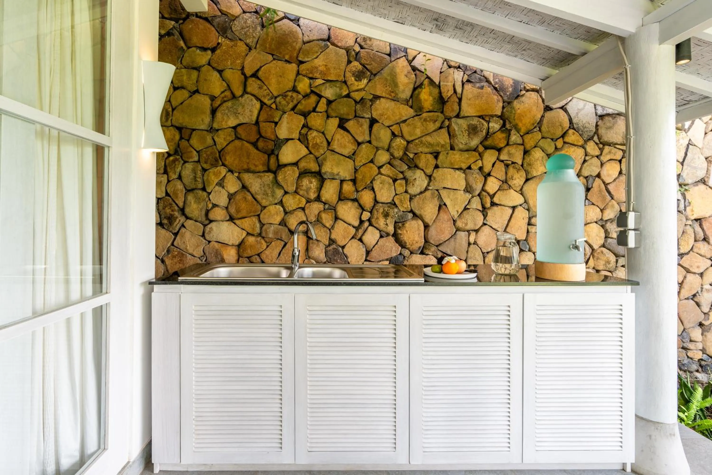 Kitchen or kitchenette in Shunyata Villas Bali