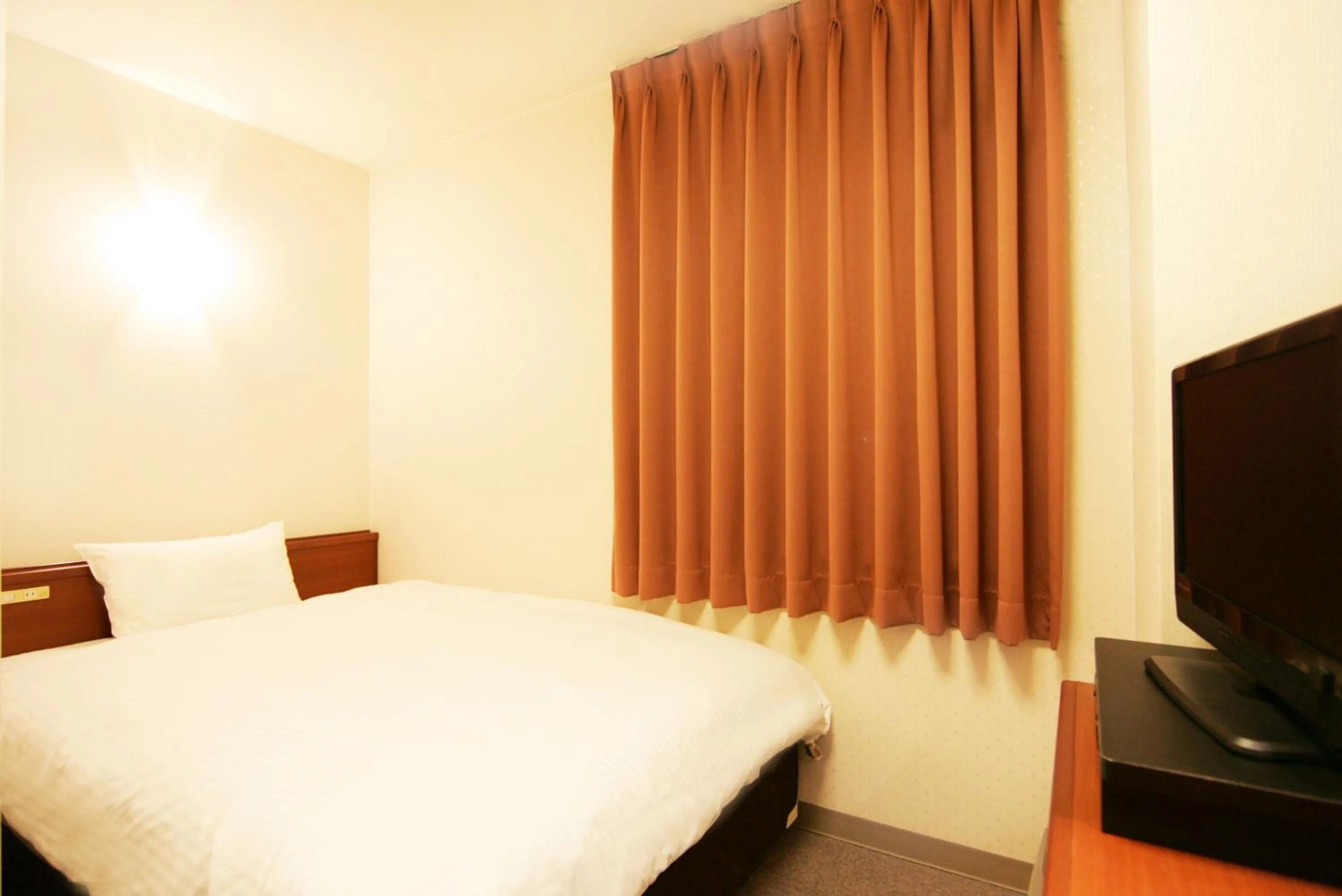 Photo of the whole room, Bed in Kochi Green Hotel Harimayabashi