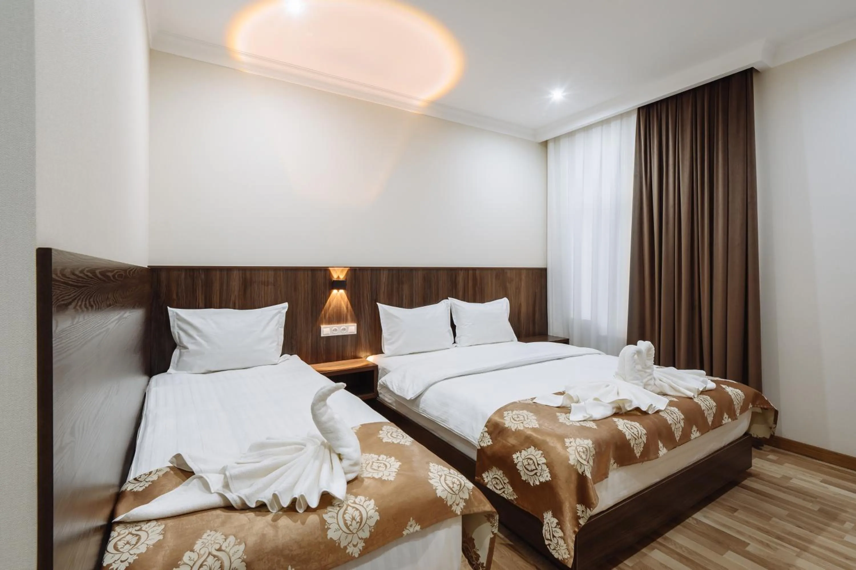 Bed in Sofiya Tashkent Hotel