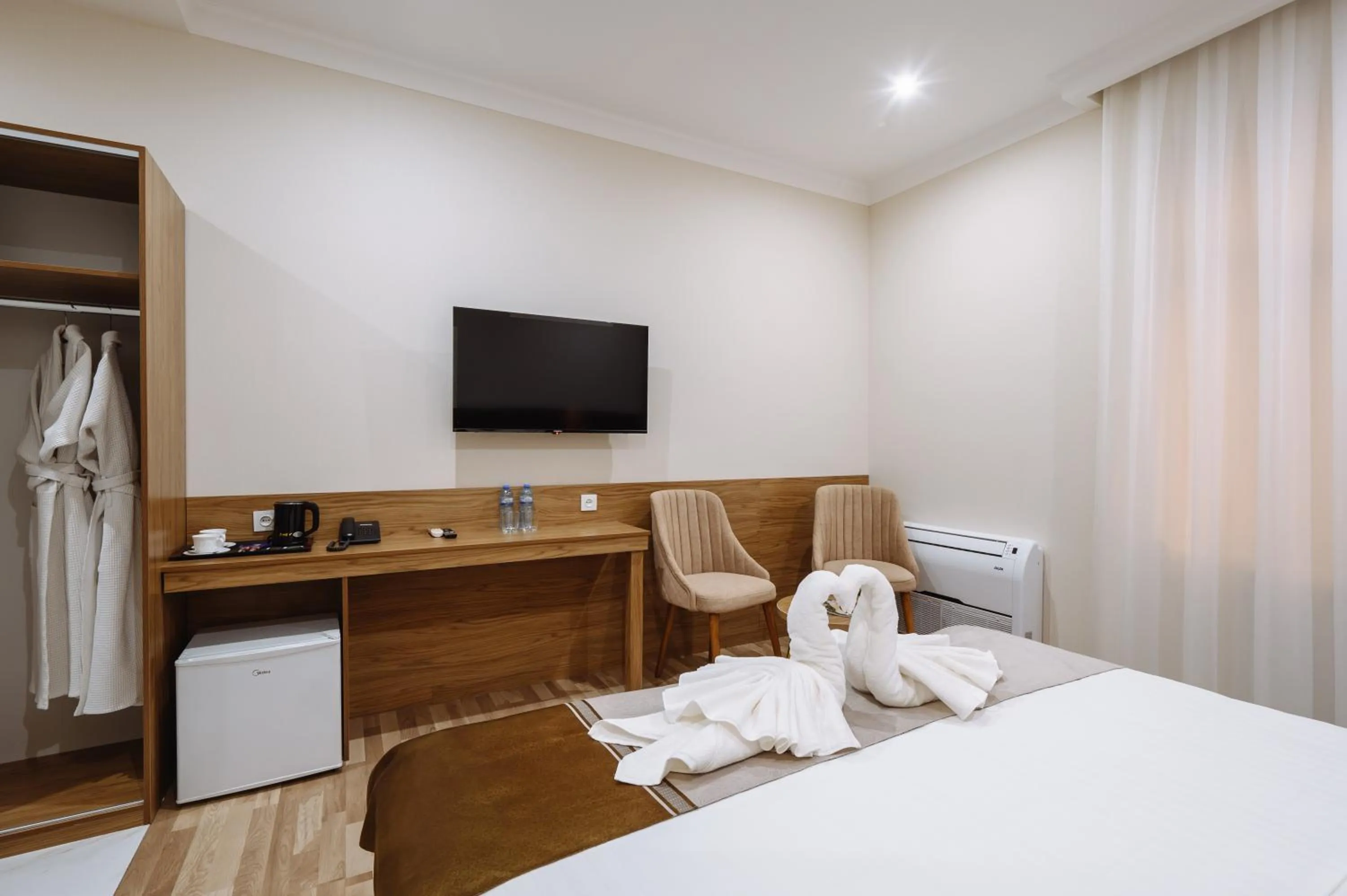 TV and multimedia, Bed in Sofiya Tashkent Hotel