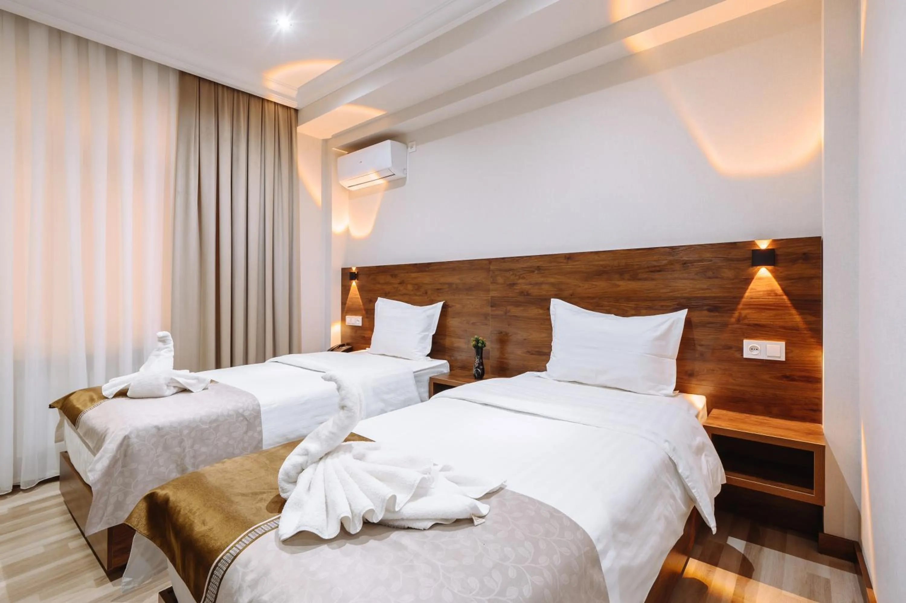 Bed in Sofiya Tashkent Hotel