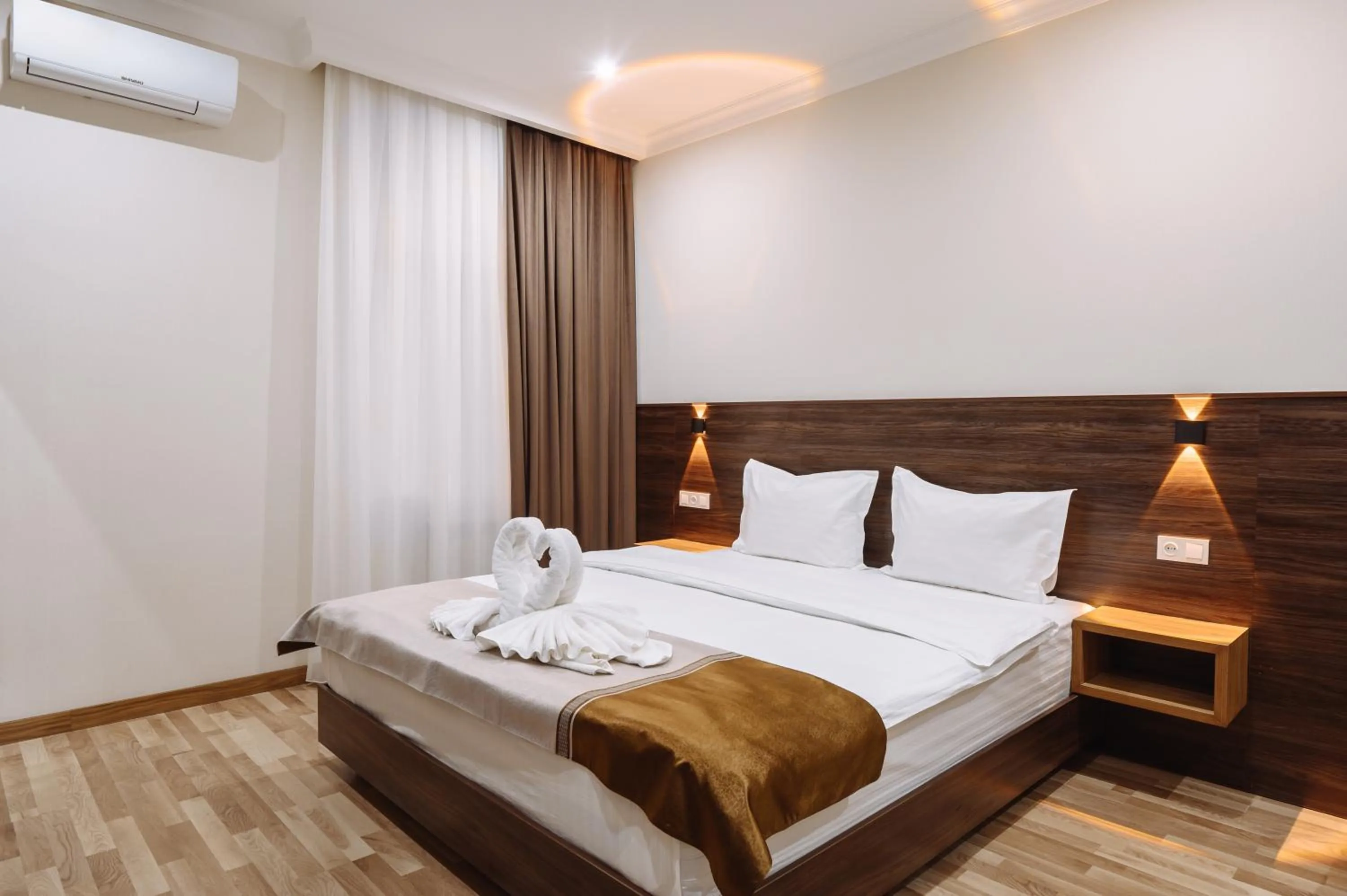 Photo of the whole room, Bed in Sofiya Tashkent Hotel