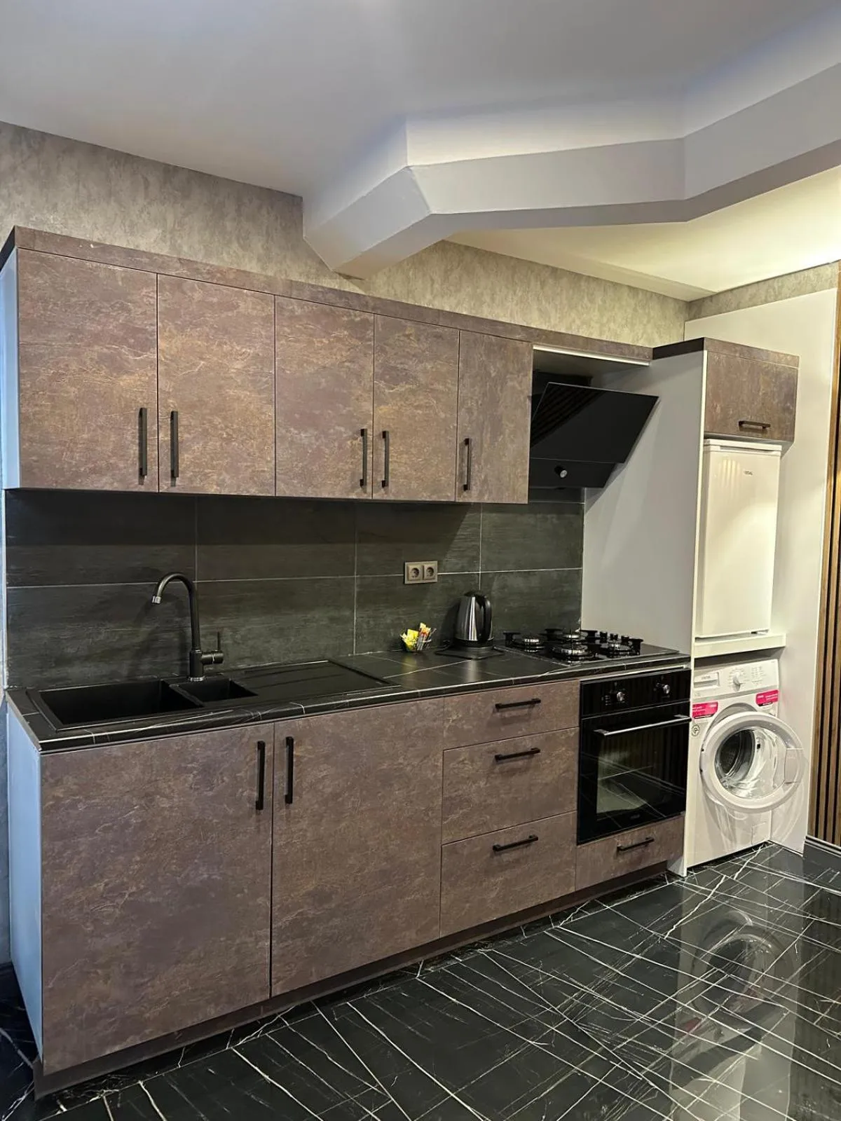 Kitchen or kitchenette in Mrt Suites Lara