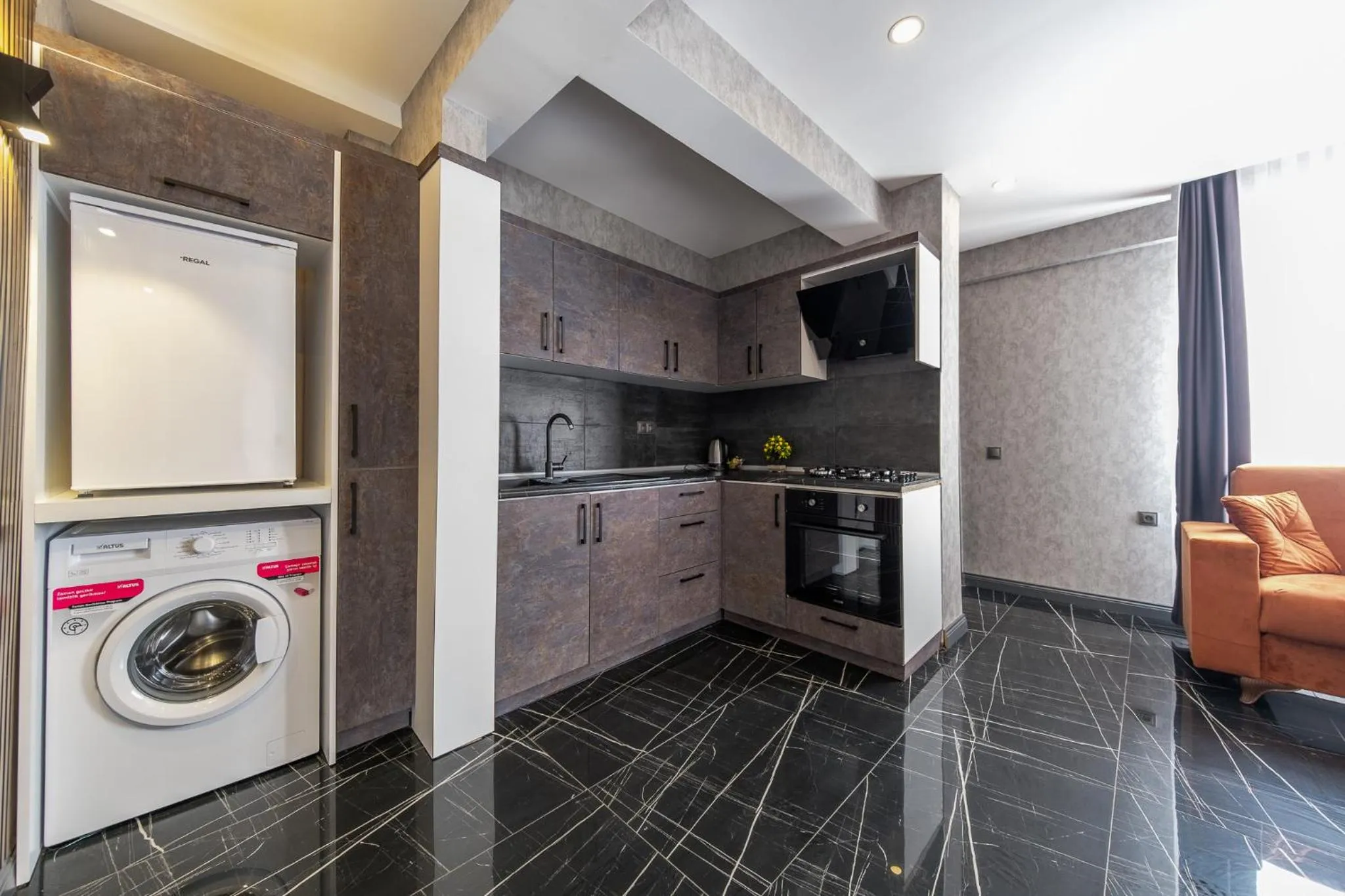 Kitchen or kitchenette in Mrt Suites Lara