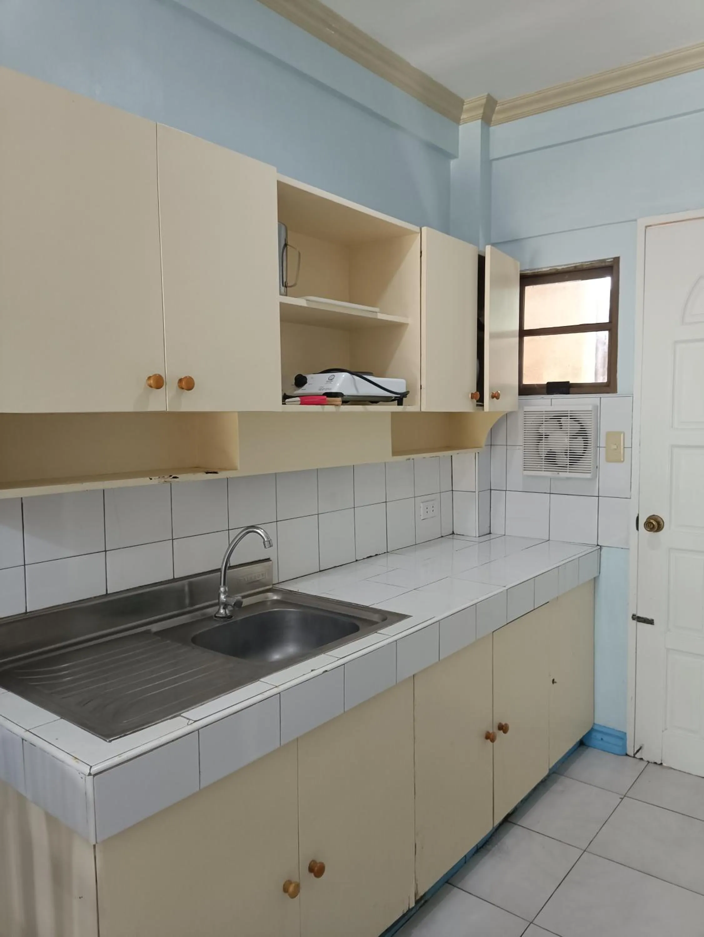 Kitchen or kitchenette in Golden Belle Apartelle and Suites