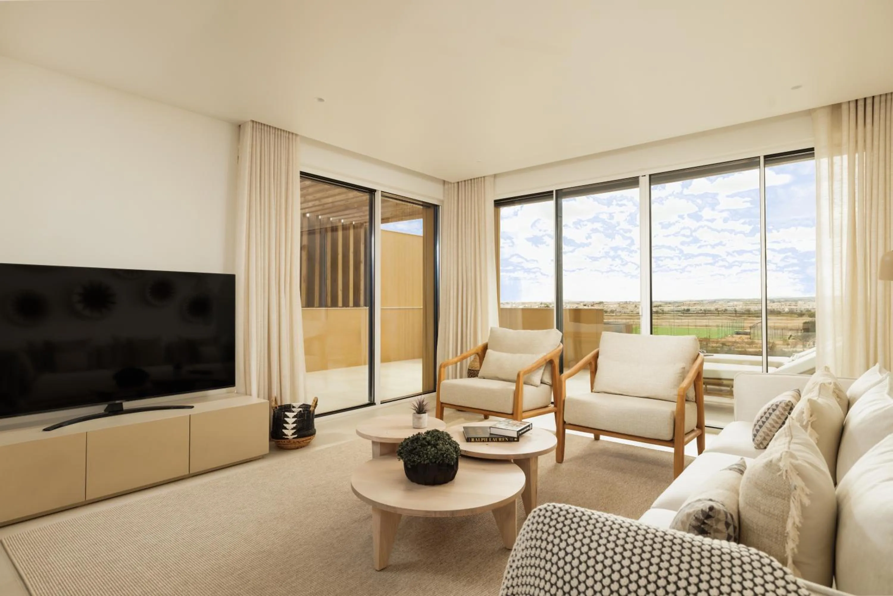 Communal lounge/ TV room in Verdelago Resort