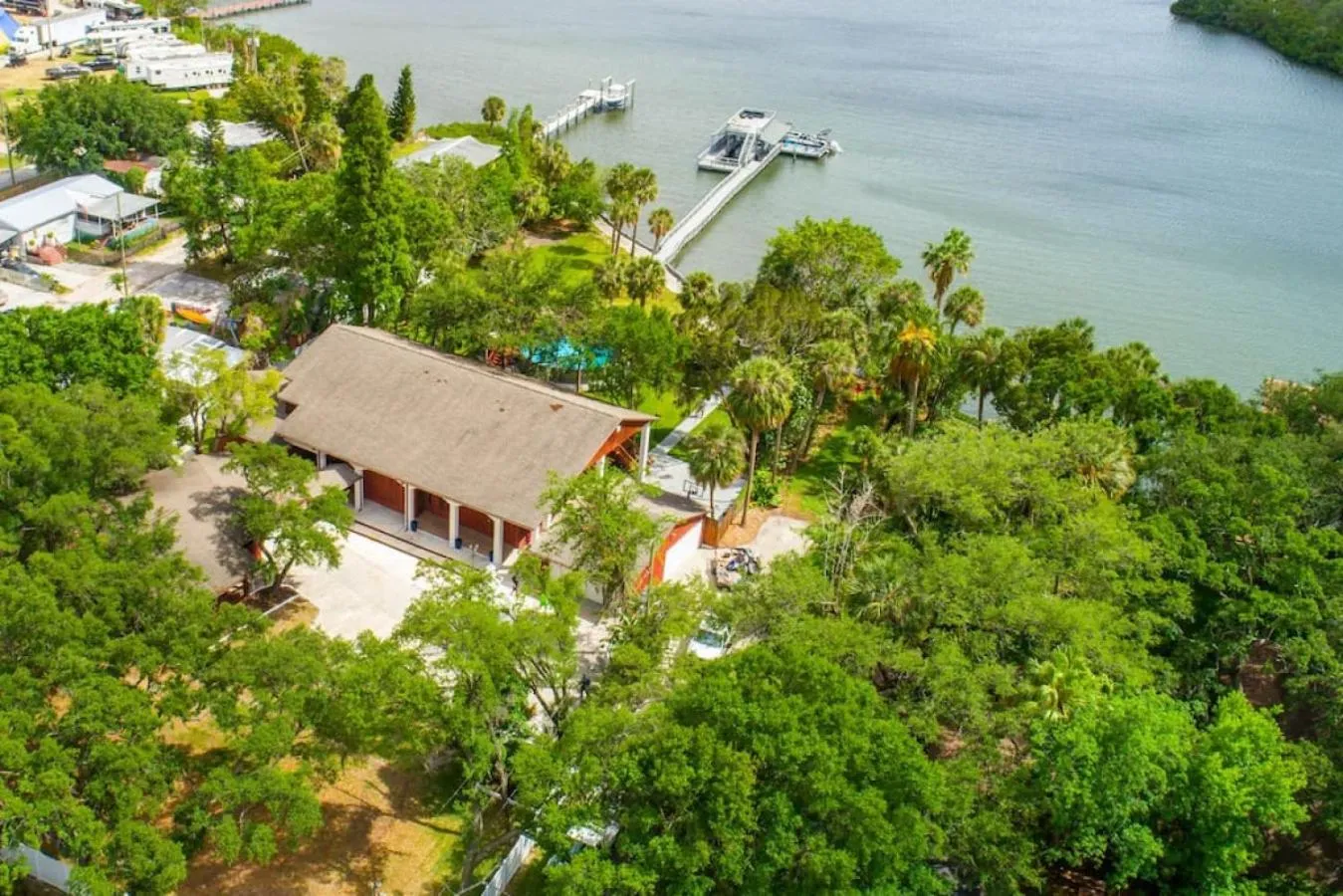 Waterfront 6BR Oasis with Pool, Gym, and Huge Dock