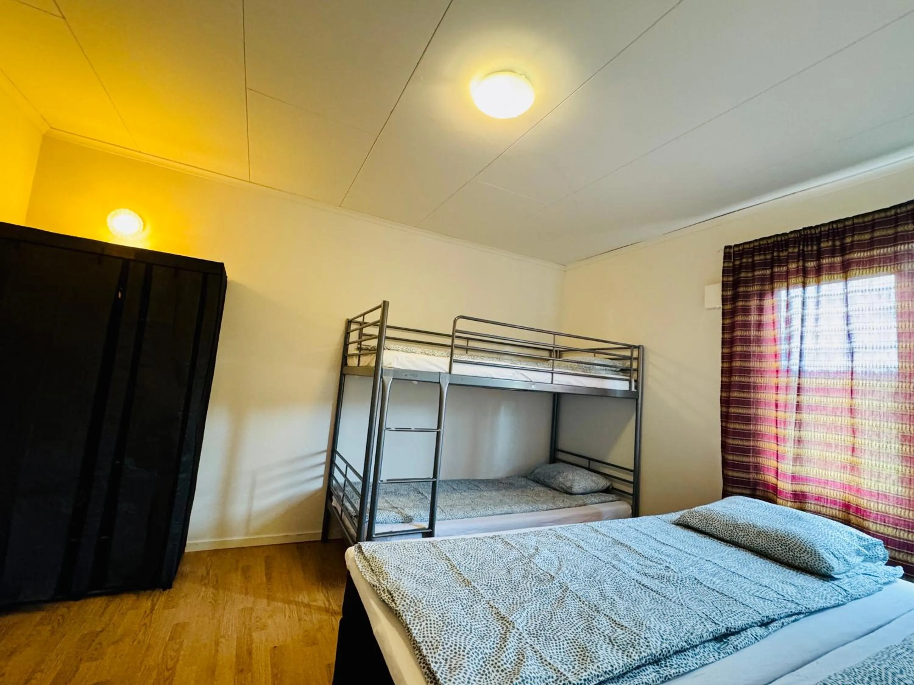 Bed in Hässlebogården Turist & Konferens