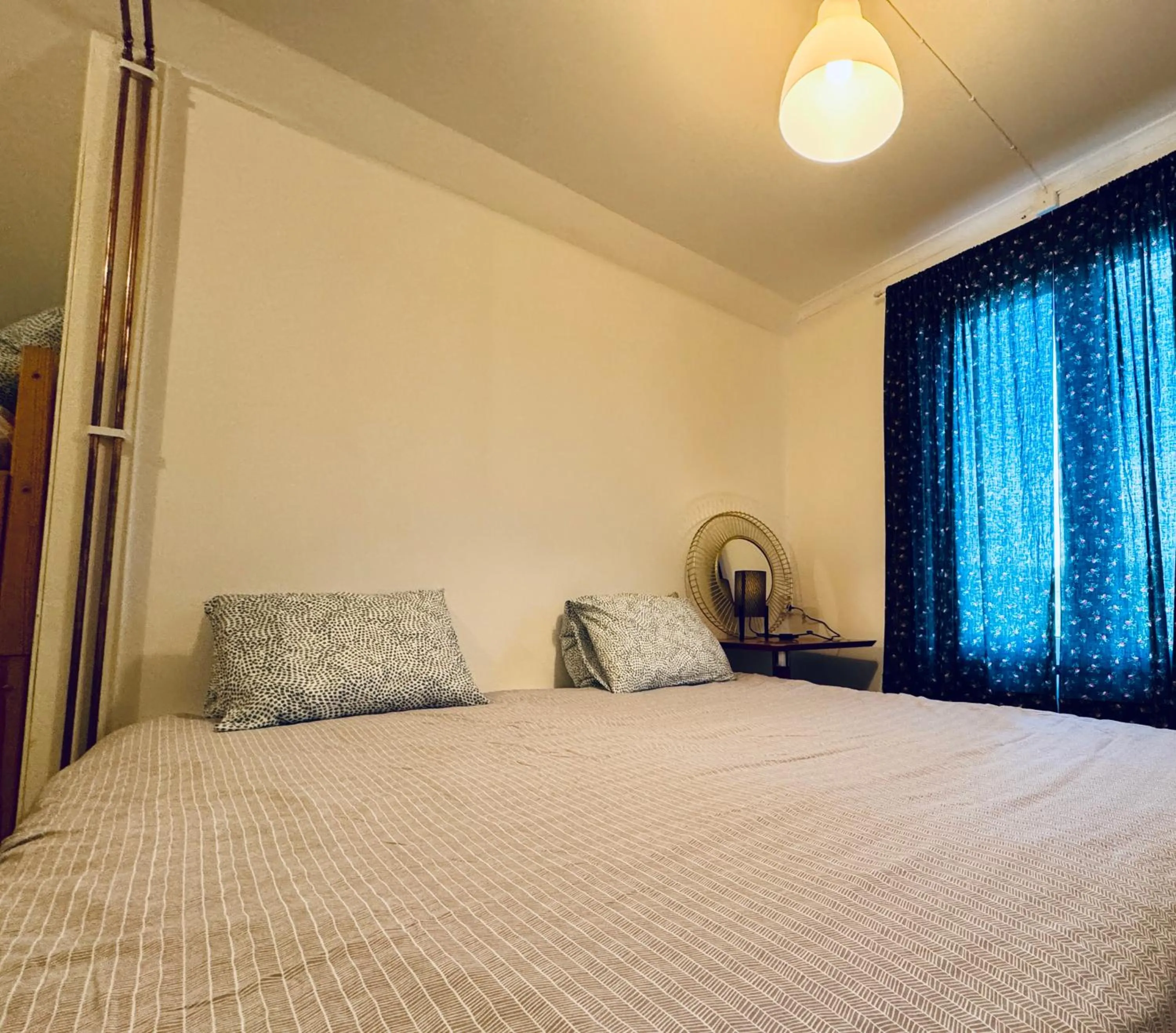 Bed in Hässlebogården Turist & Konferens