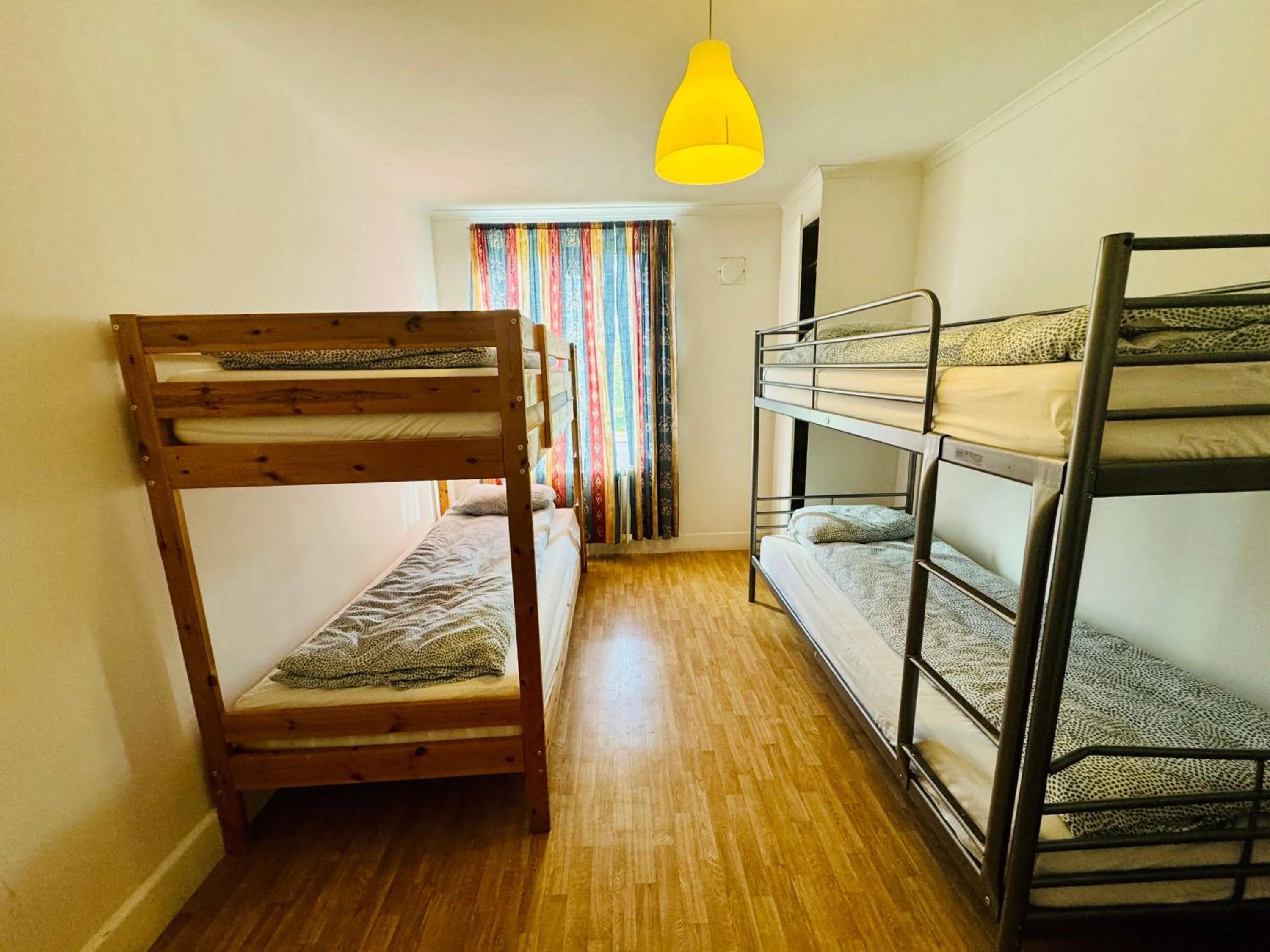 Bed in Hässlebogården Turist & Konferens