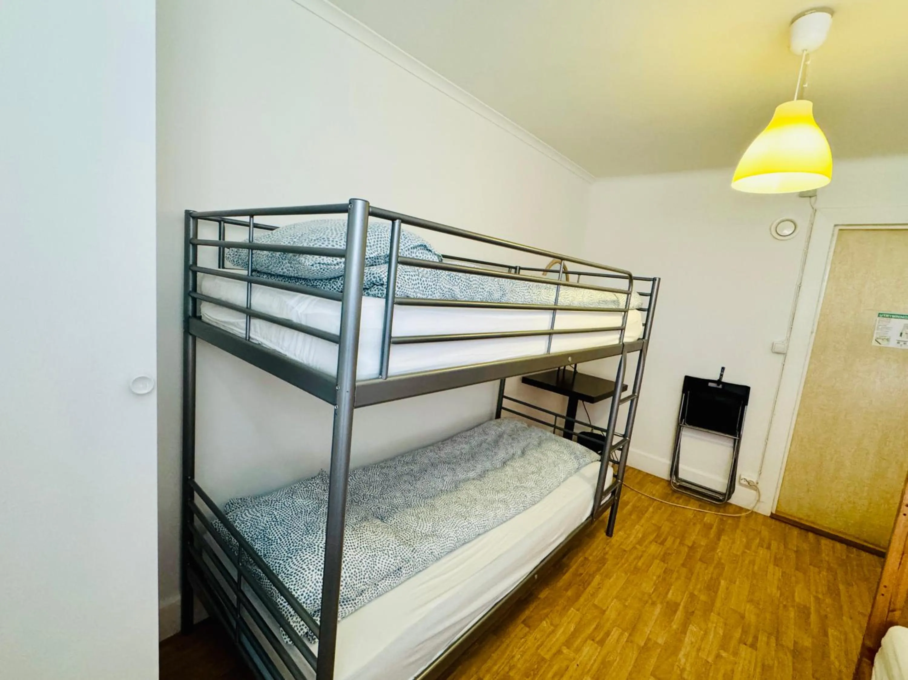 Bed in Hässlebogården Turist & Konferens