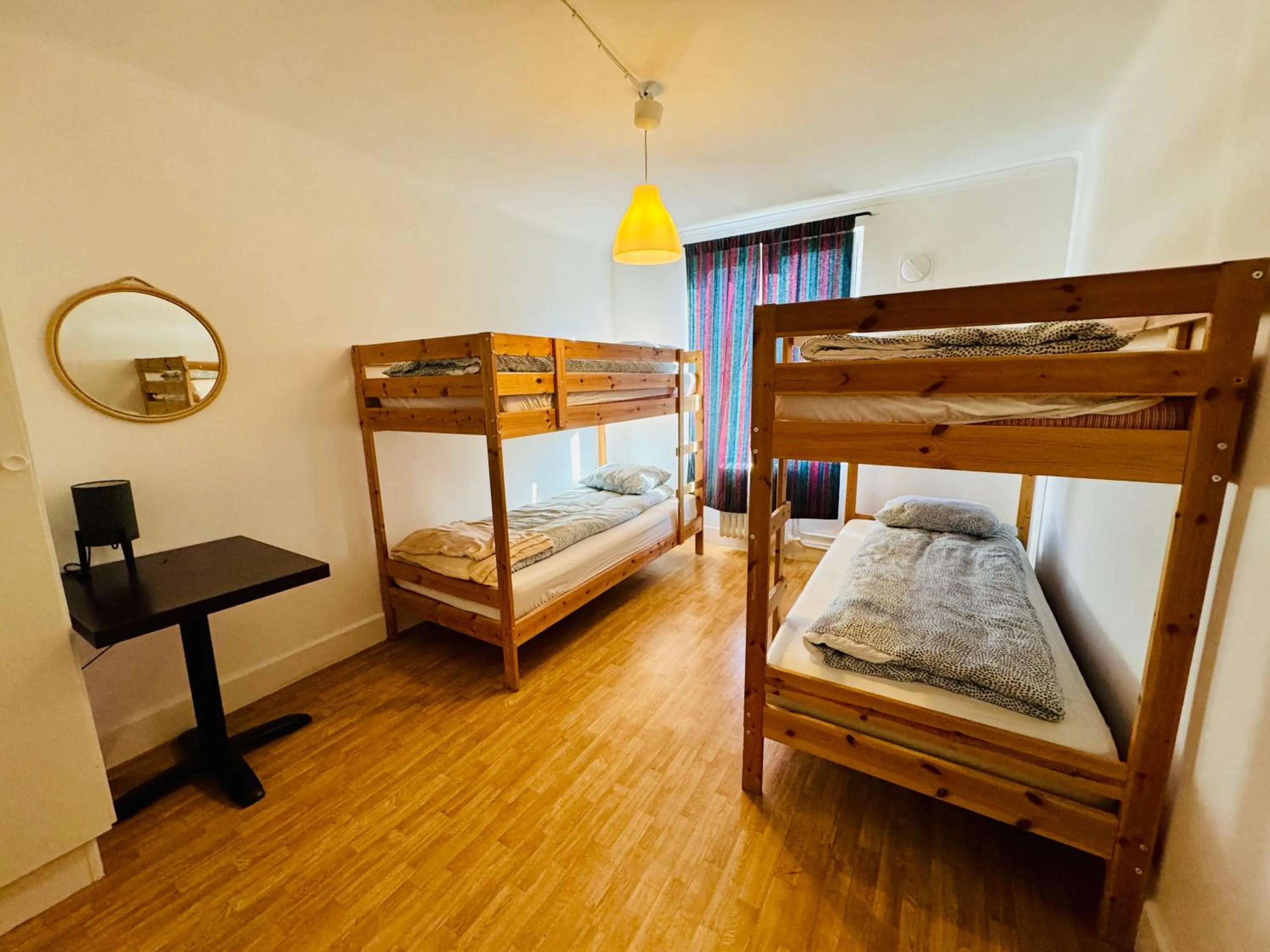 Bed in Hässlebogården Turist & Konferens