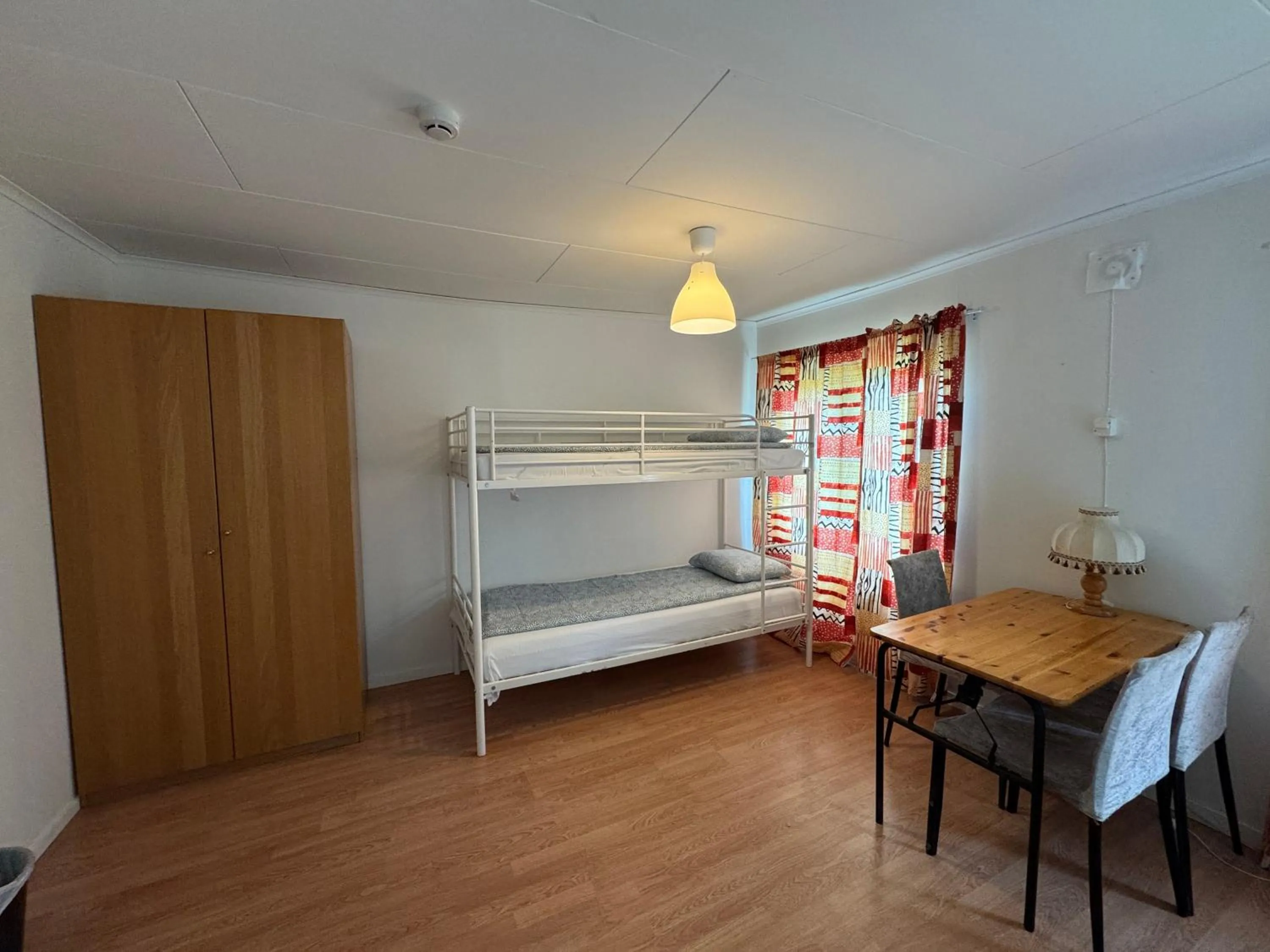 Seating area, Bed in Hässlebogården Turist & Konferens