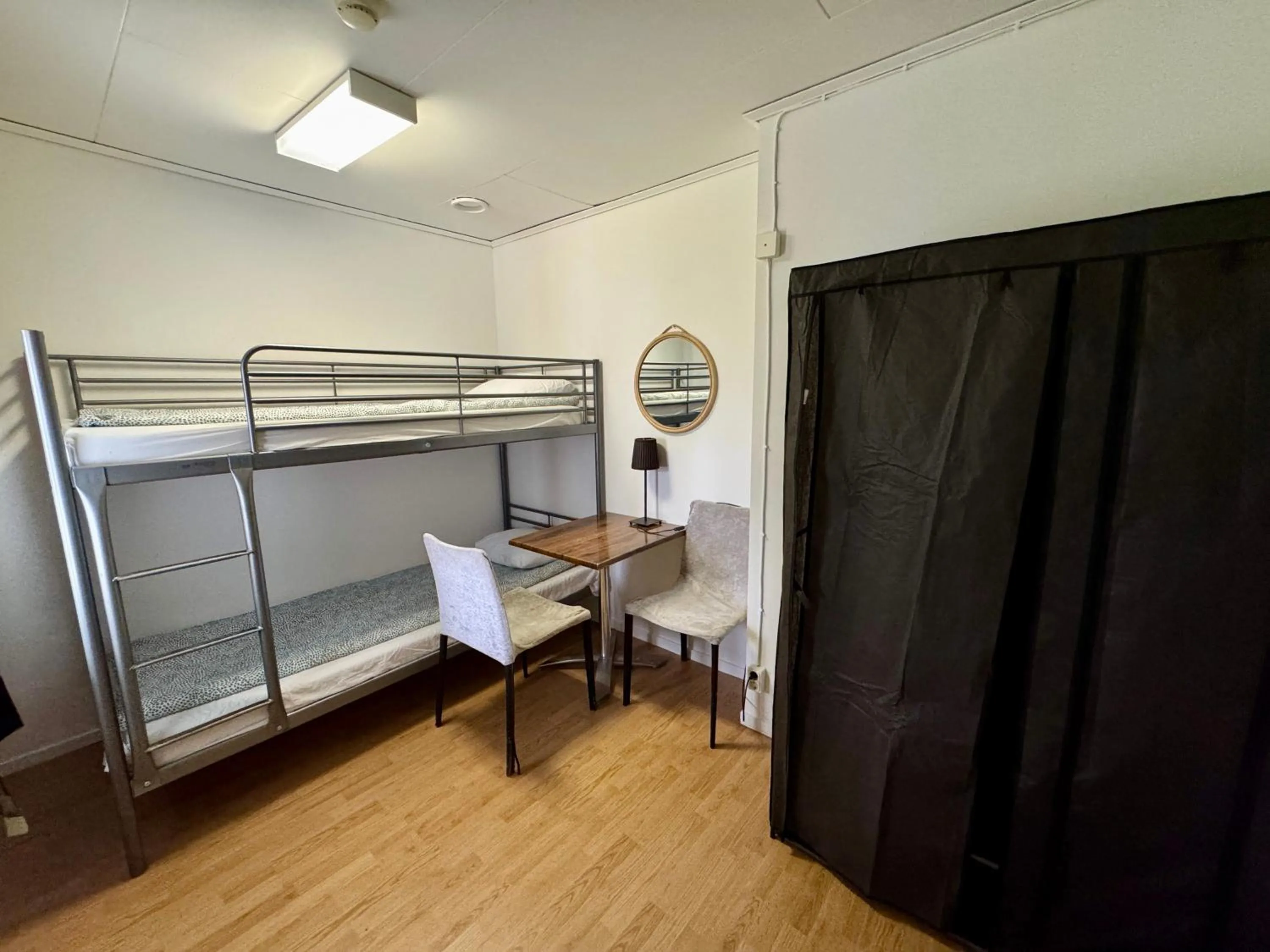 Bed in Hässlebogården Turist & Konferens