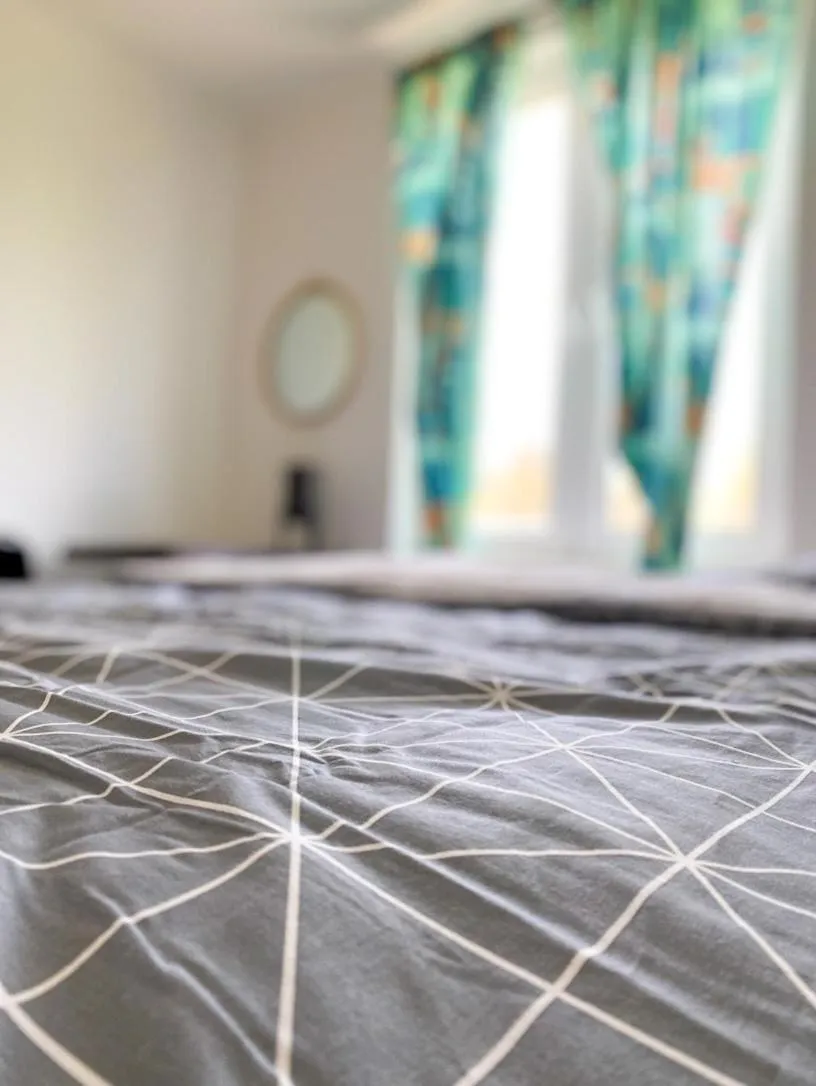 Bed in Hässlebogården Turist & Konferens