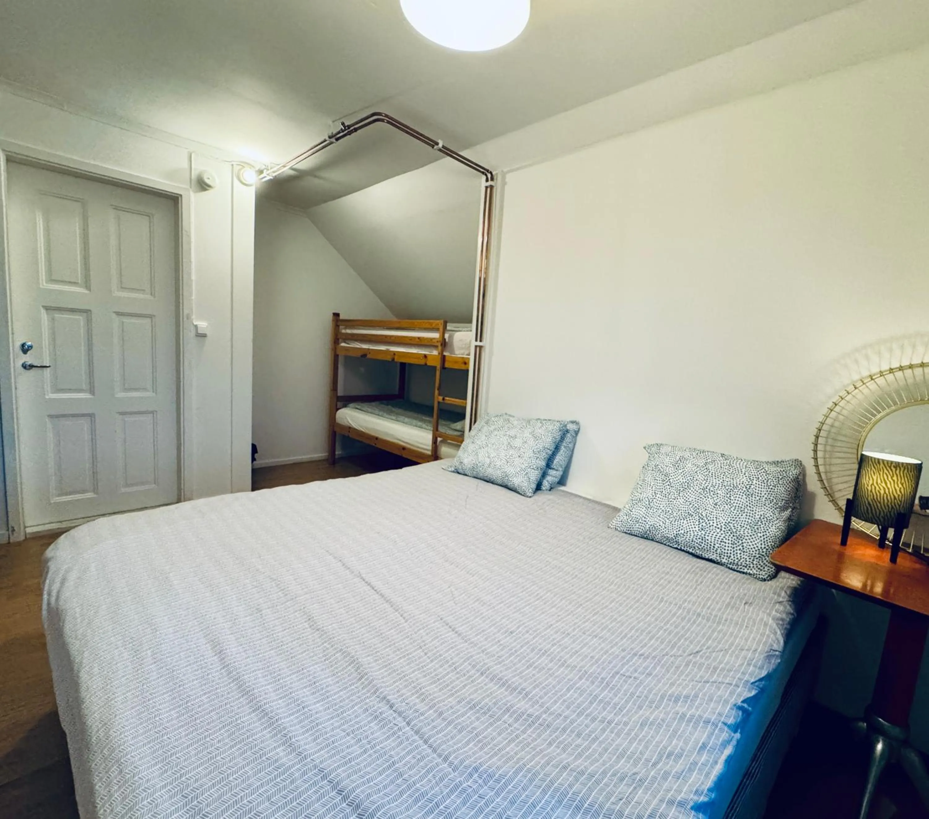 Bed in Hässlebogården Turist & Konferens