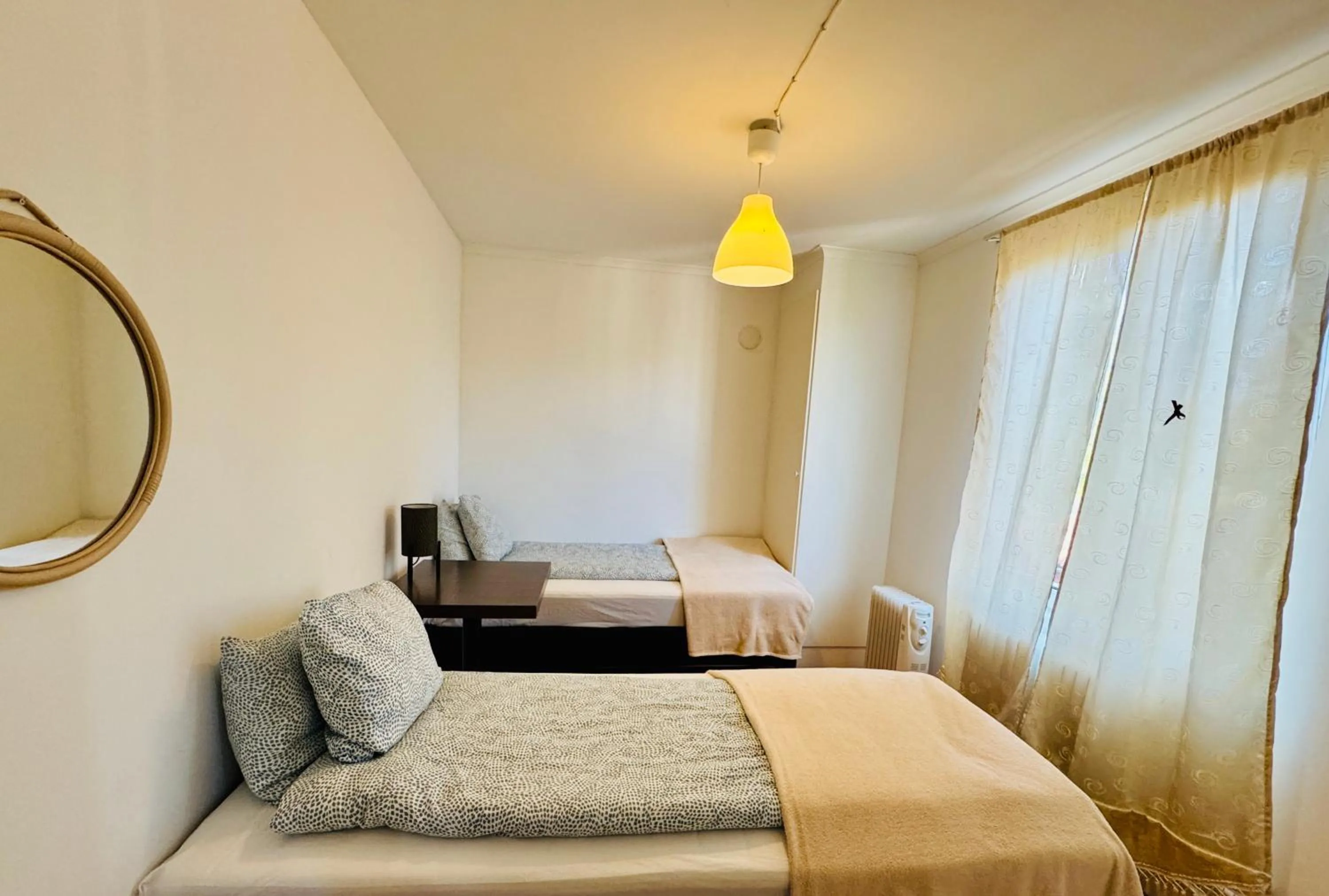 Bed in Hässlebogården Turist & Konferens