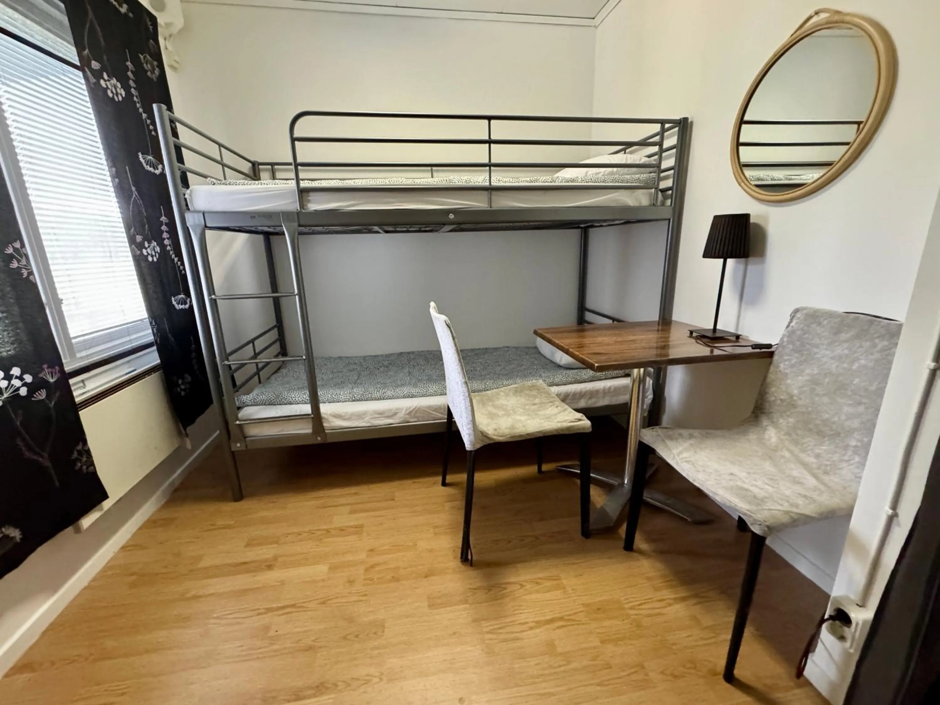 Bed in Hässlebogården Turist & Konferens