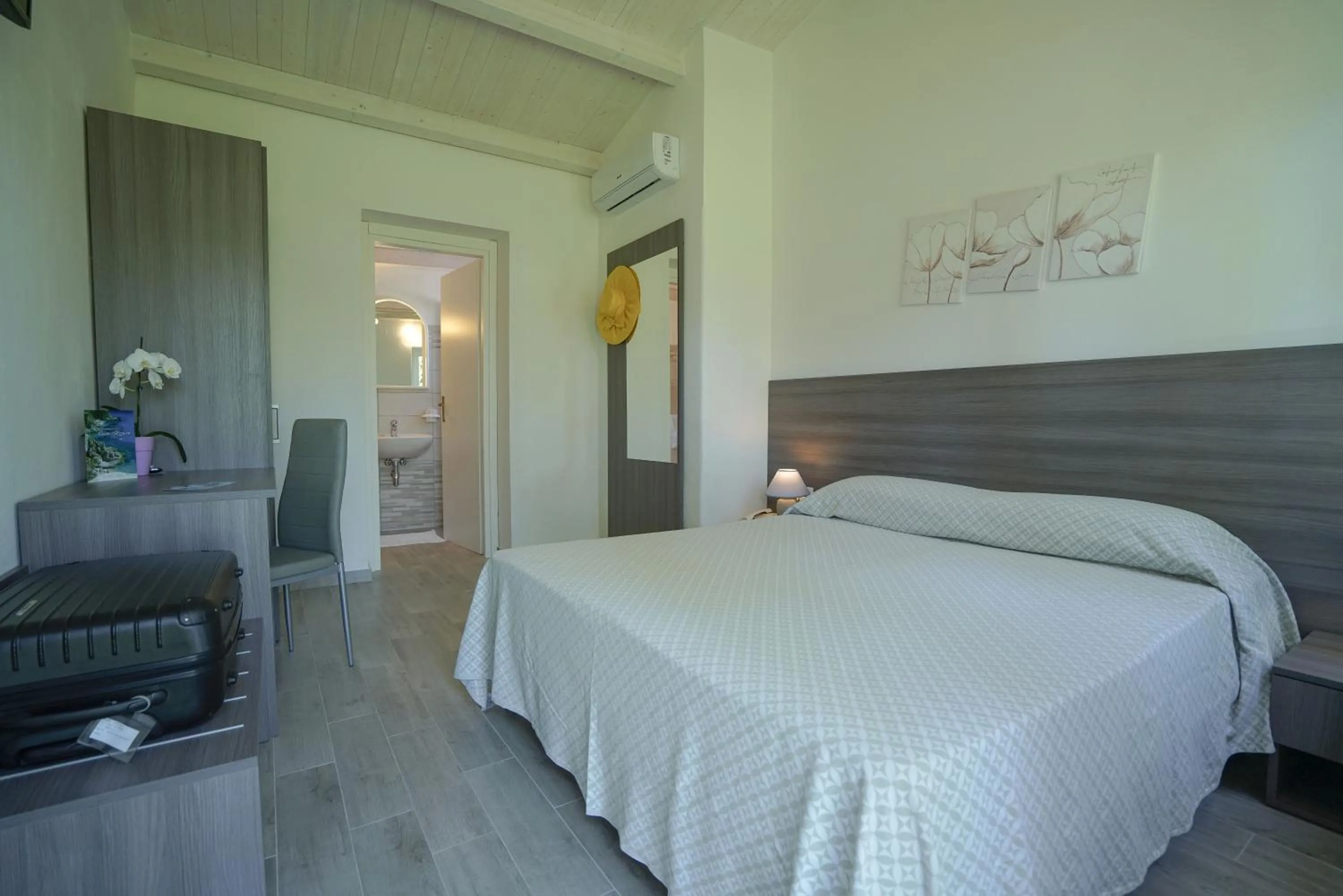 Bed in Hotel Residence Costa Azzurra