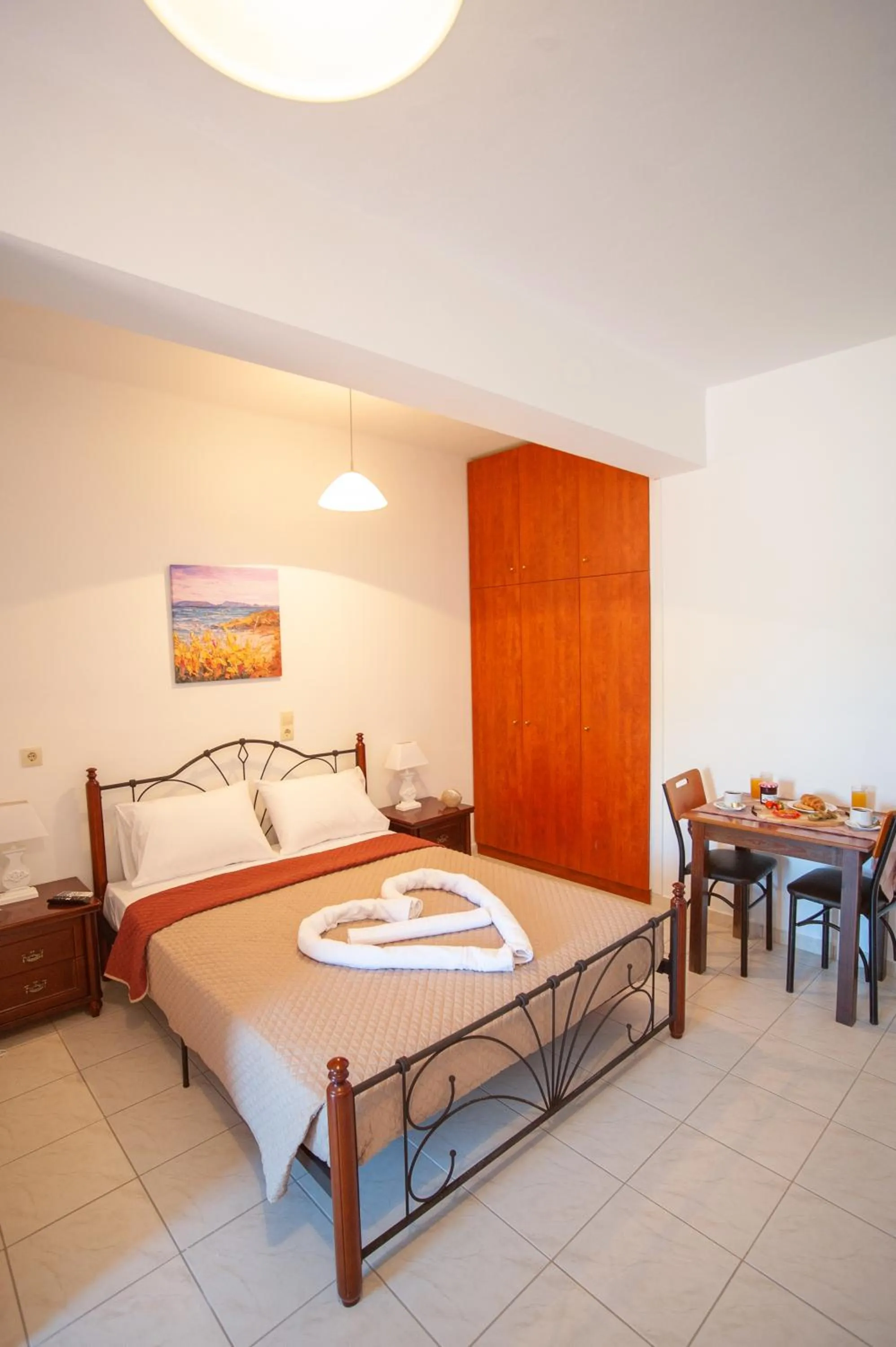 Bed in Almy Beach Hotel