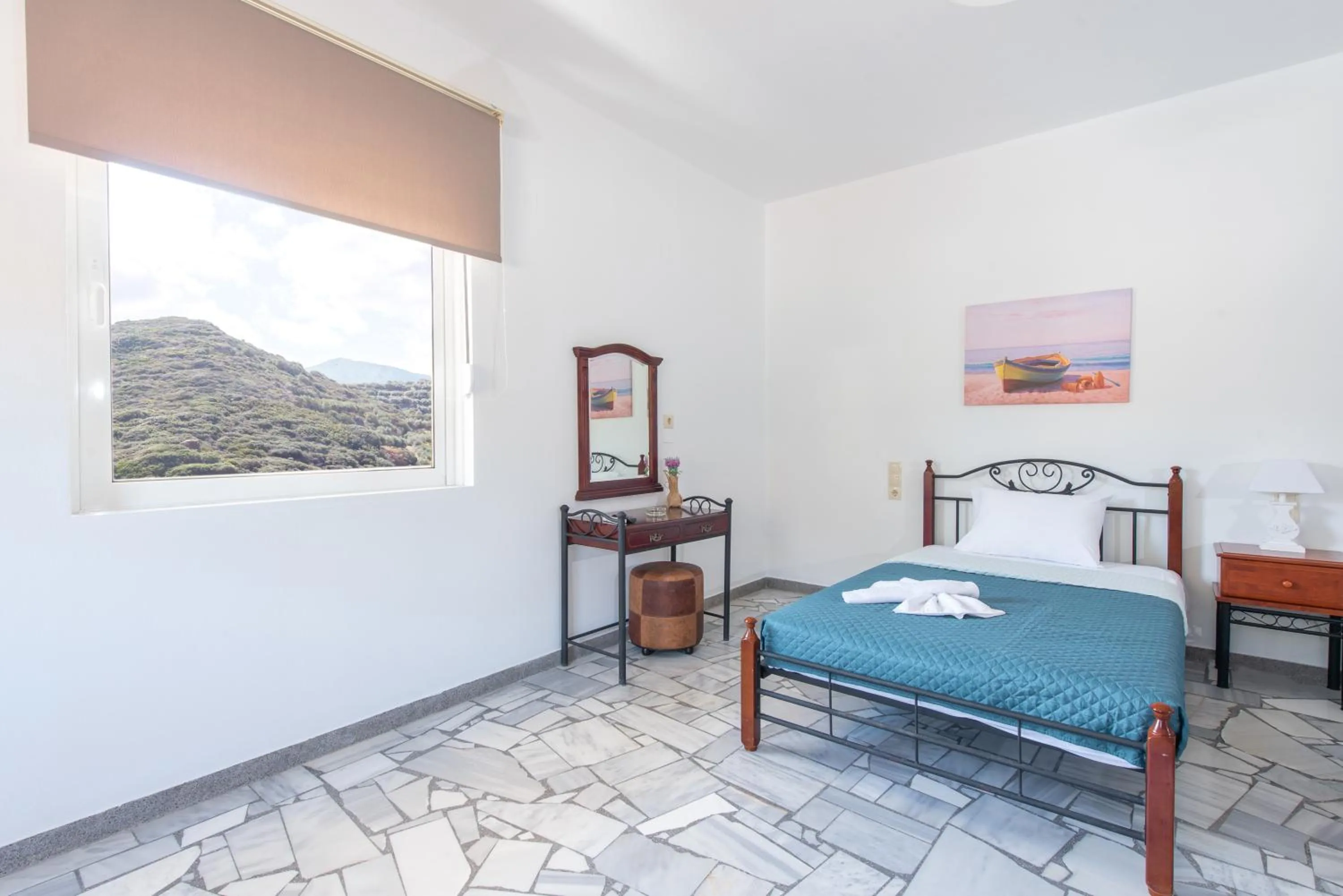 Bed in Almy Beach Hotel