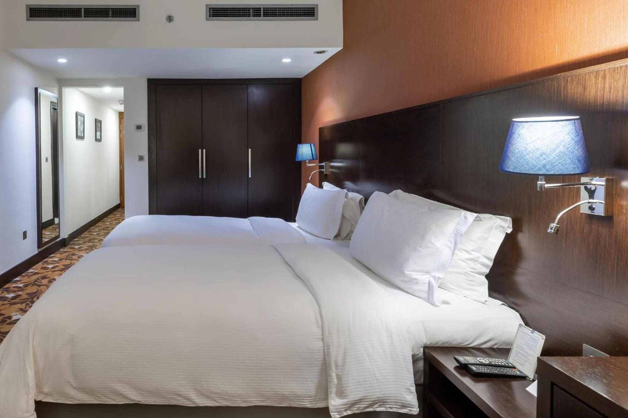 Bed in Babylon Rotana Hotel