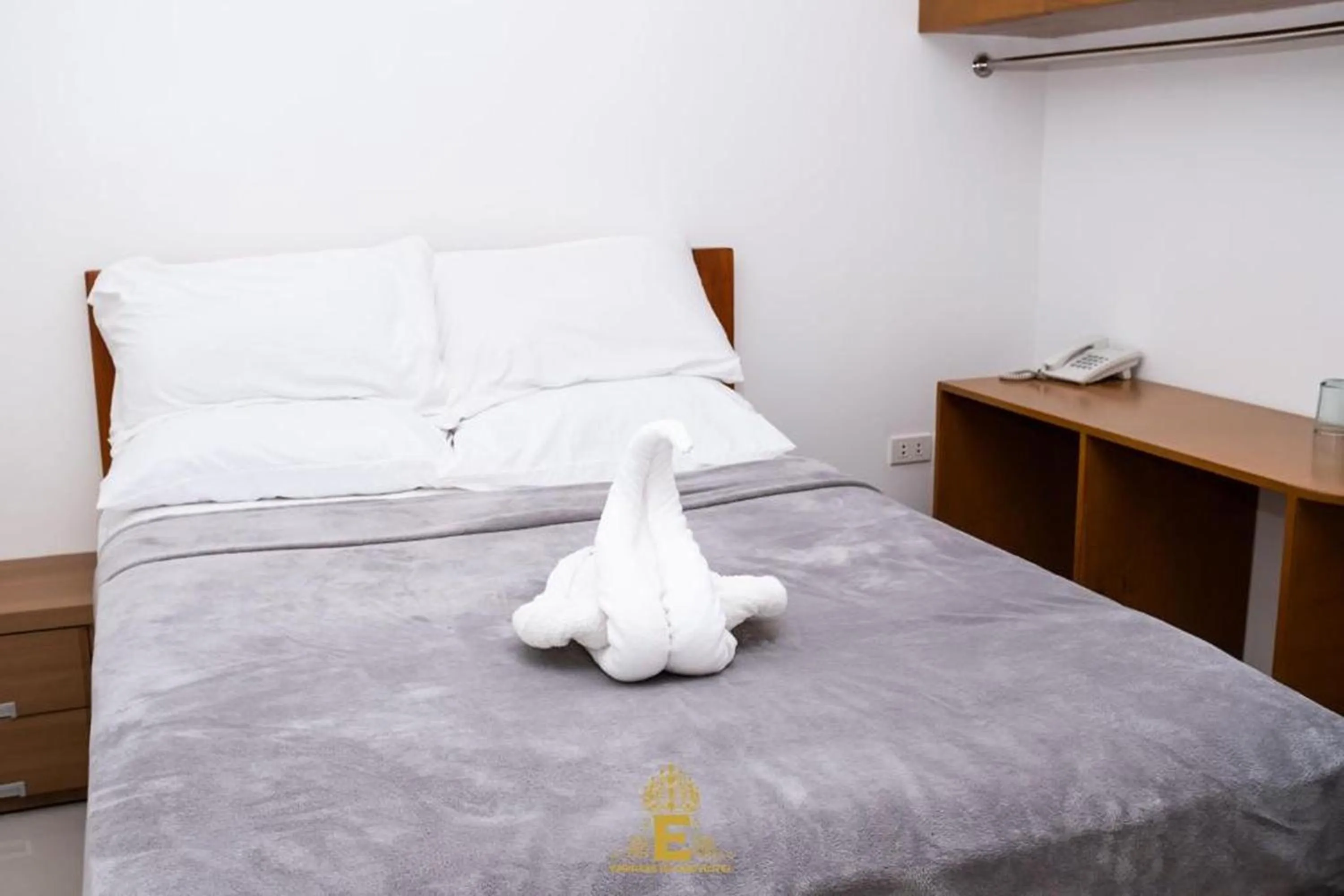 Bed in Empress Island Hotel