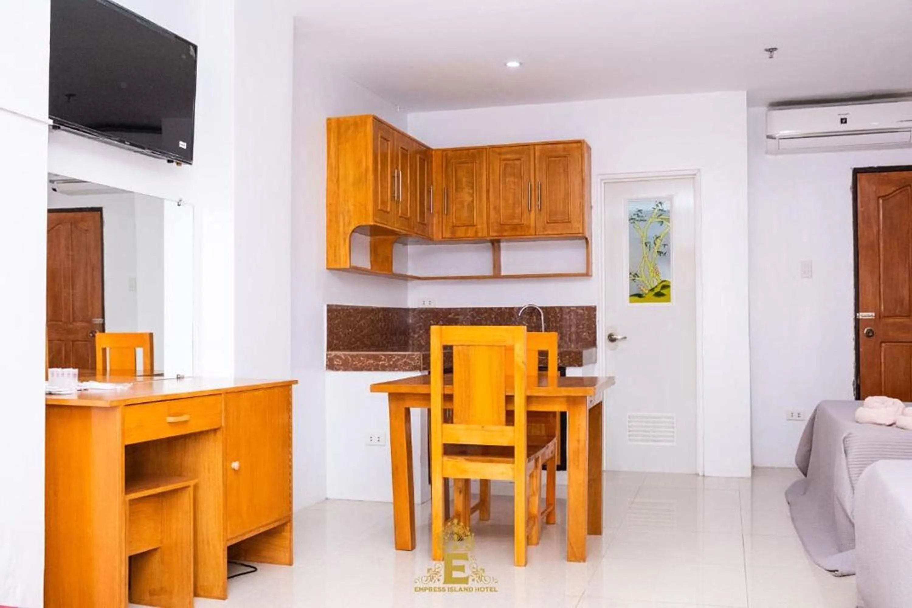 Kitchen or kitchenette in Empress Island Hotel