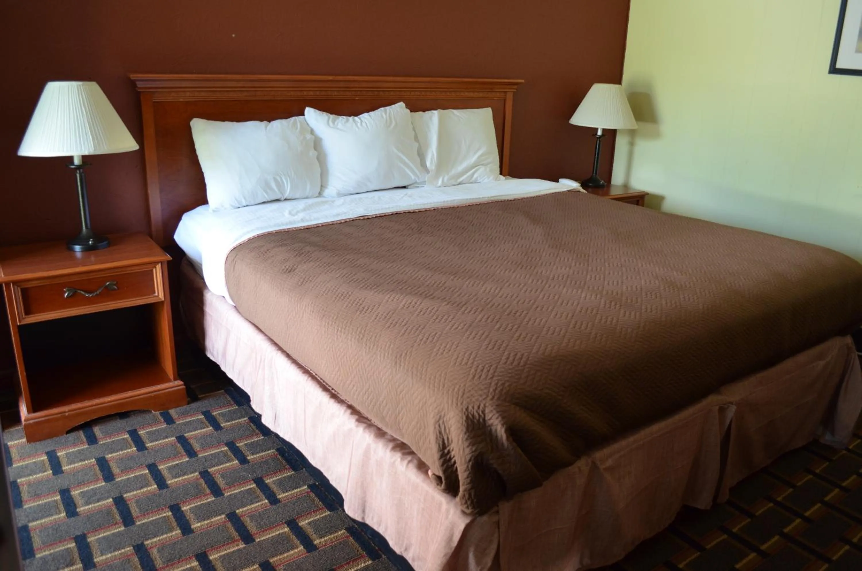 Bed in Greystone Motel