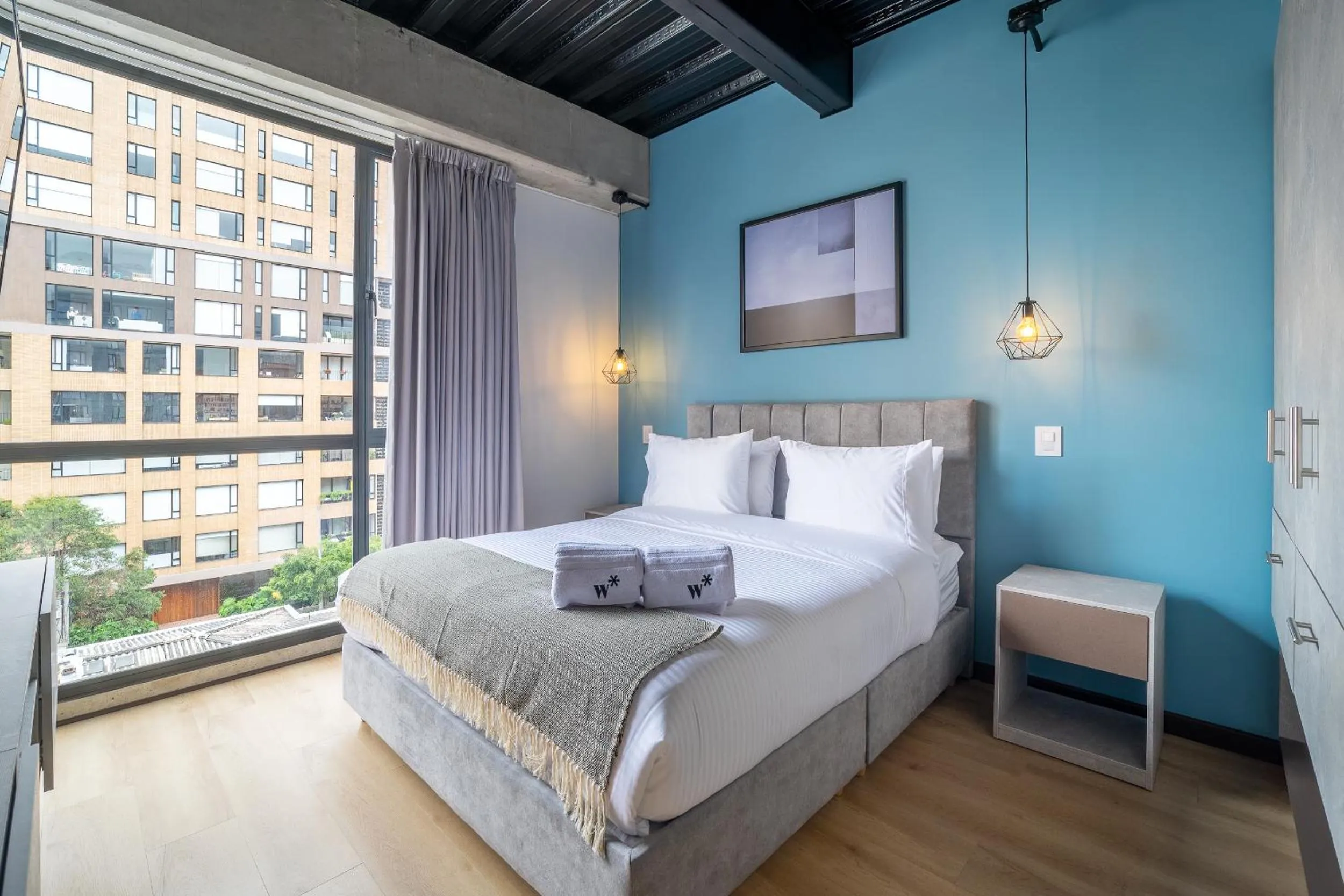 Bed in Beliving by Wynwood House