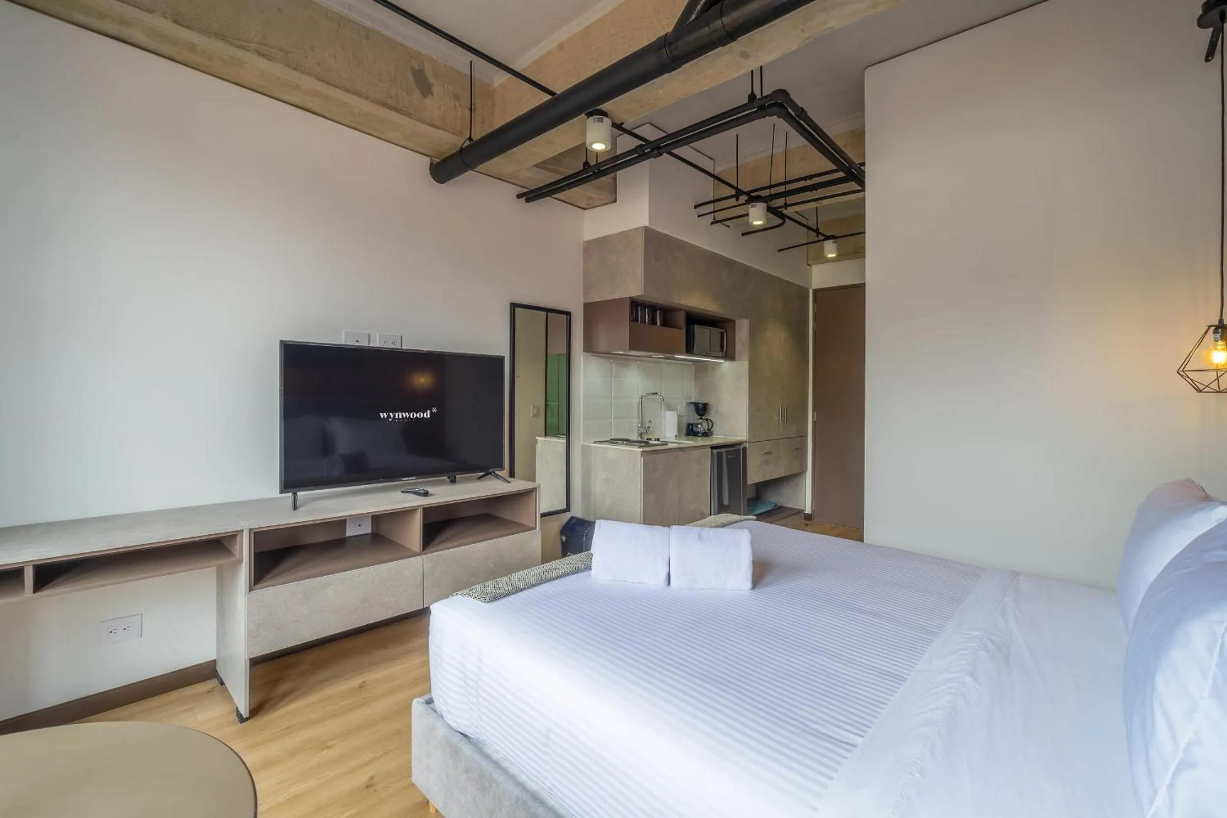 Bed in Beliving by Wynwood House