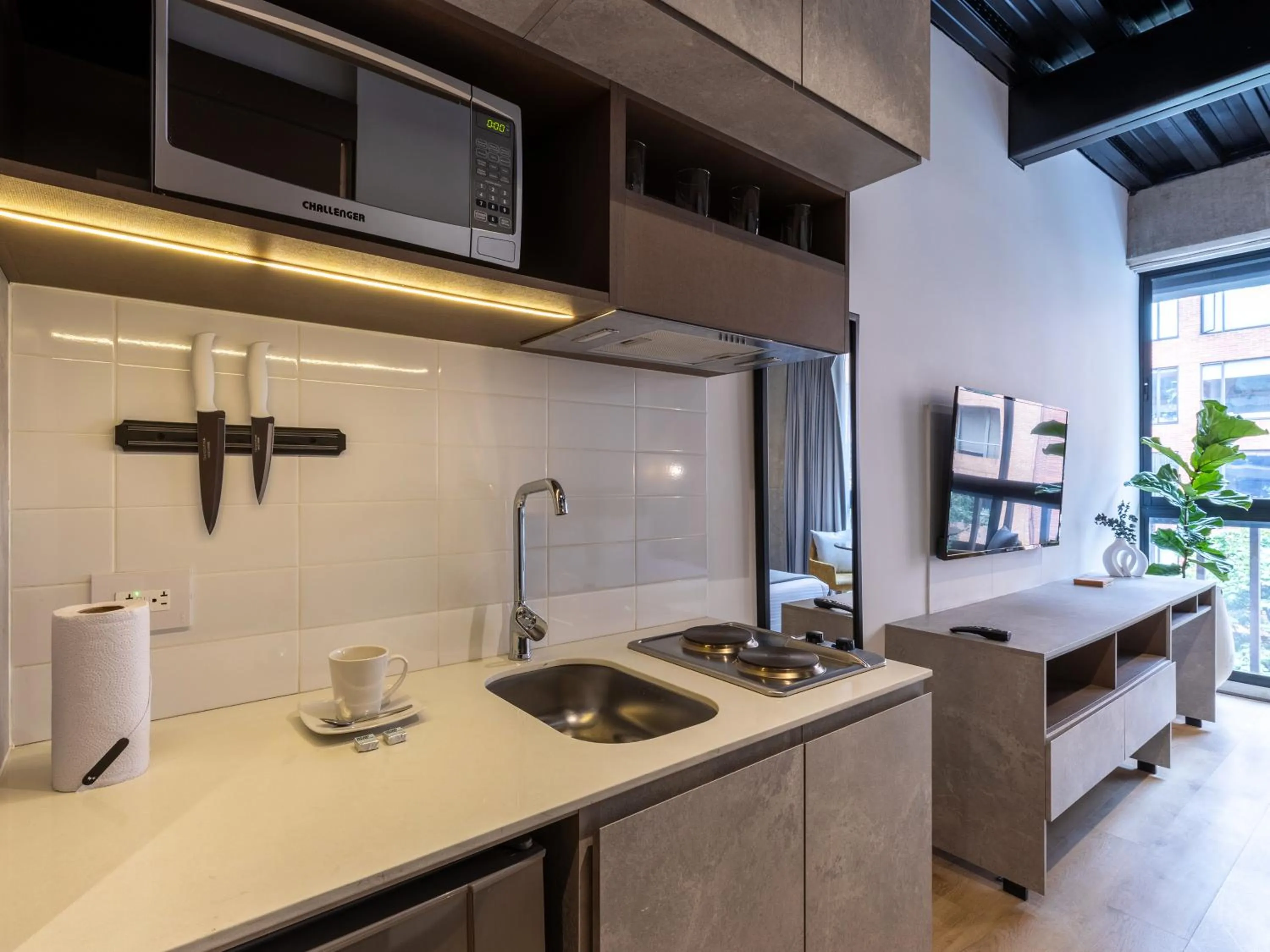 Kitchen or kitchenette in Beliving by Wynwood House