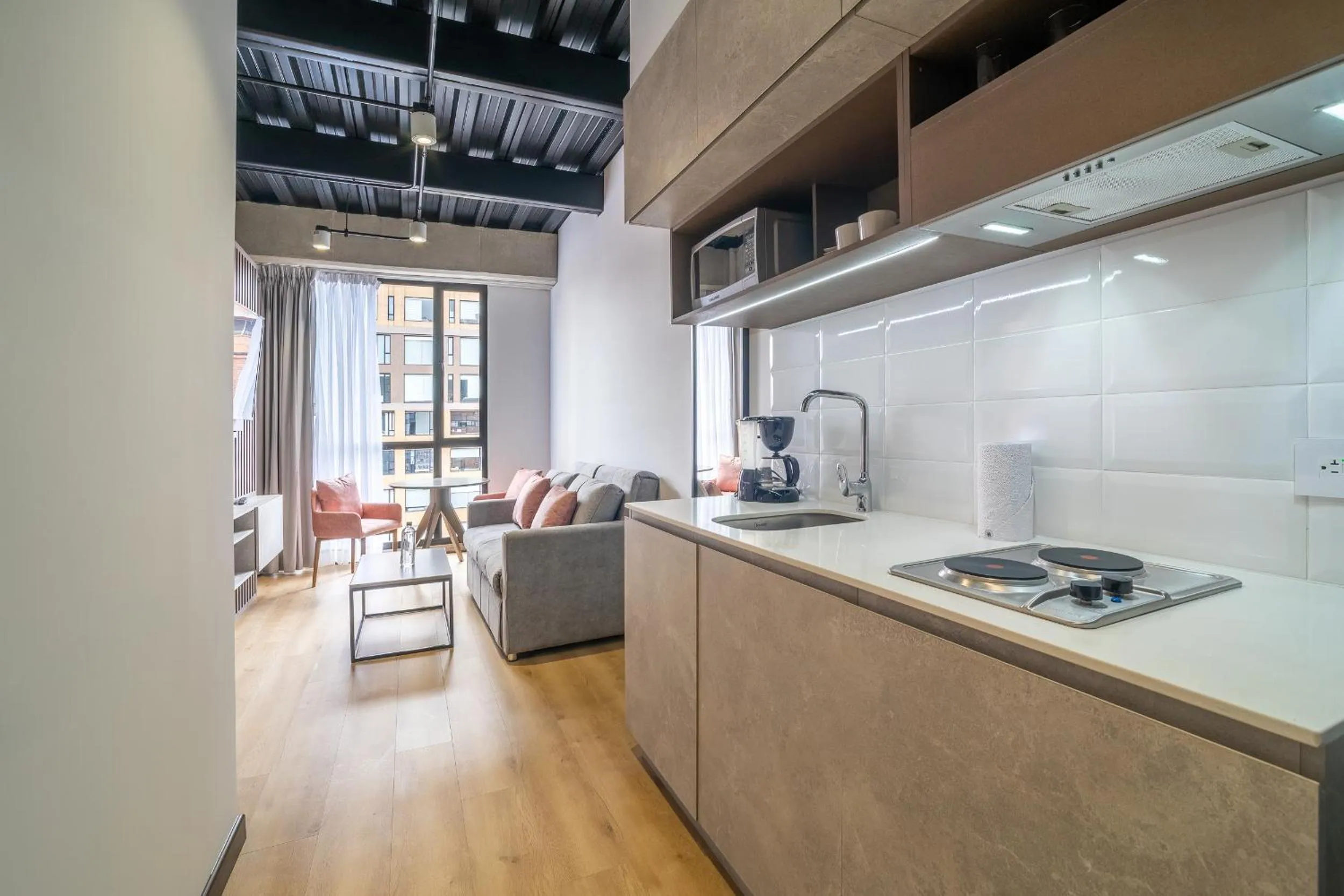 Kitchen or kitchenette in Beliving by Wynwood House