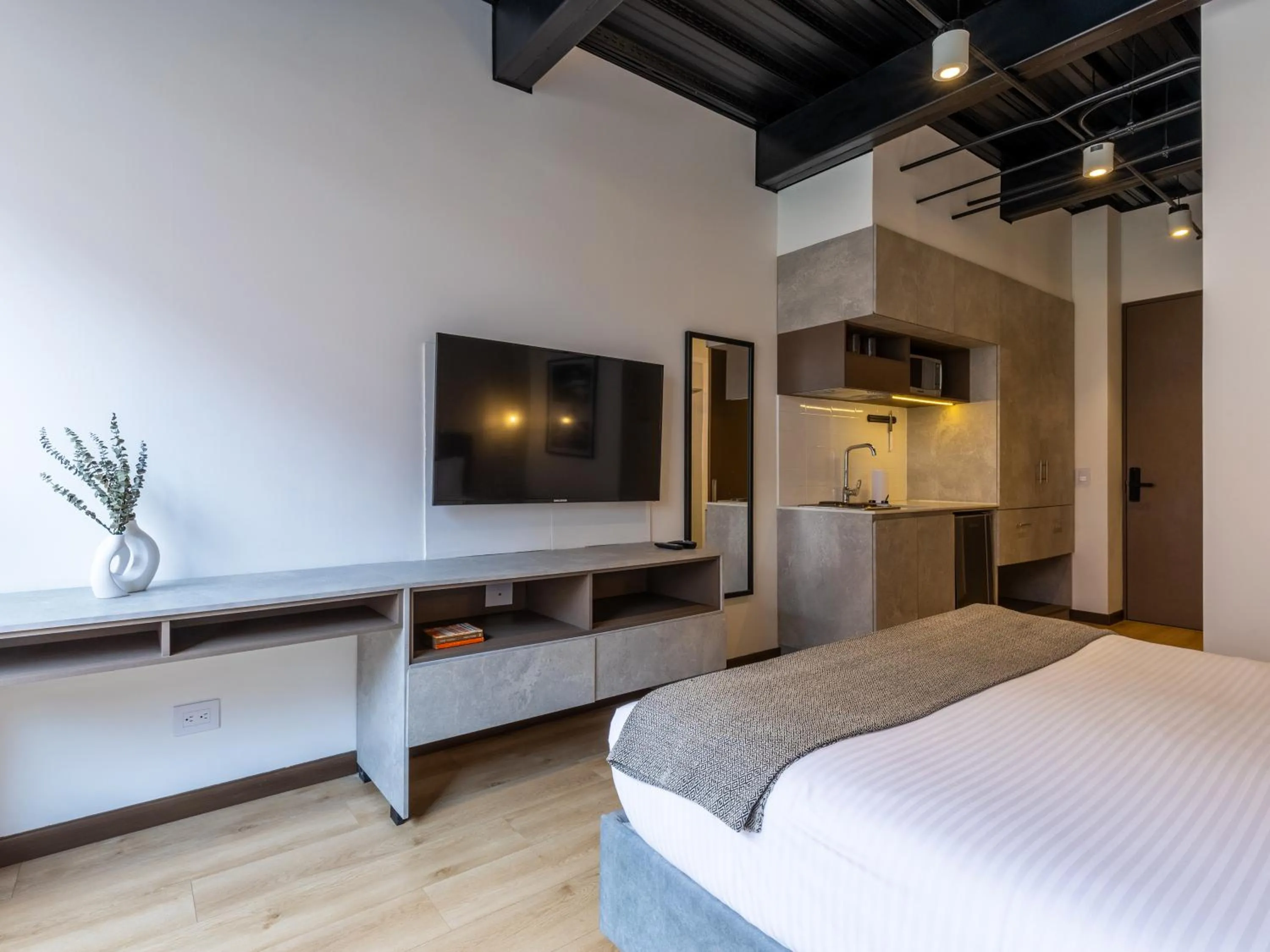 Bed in Beliving by Wynwood House