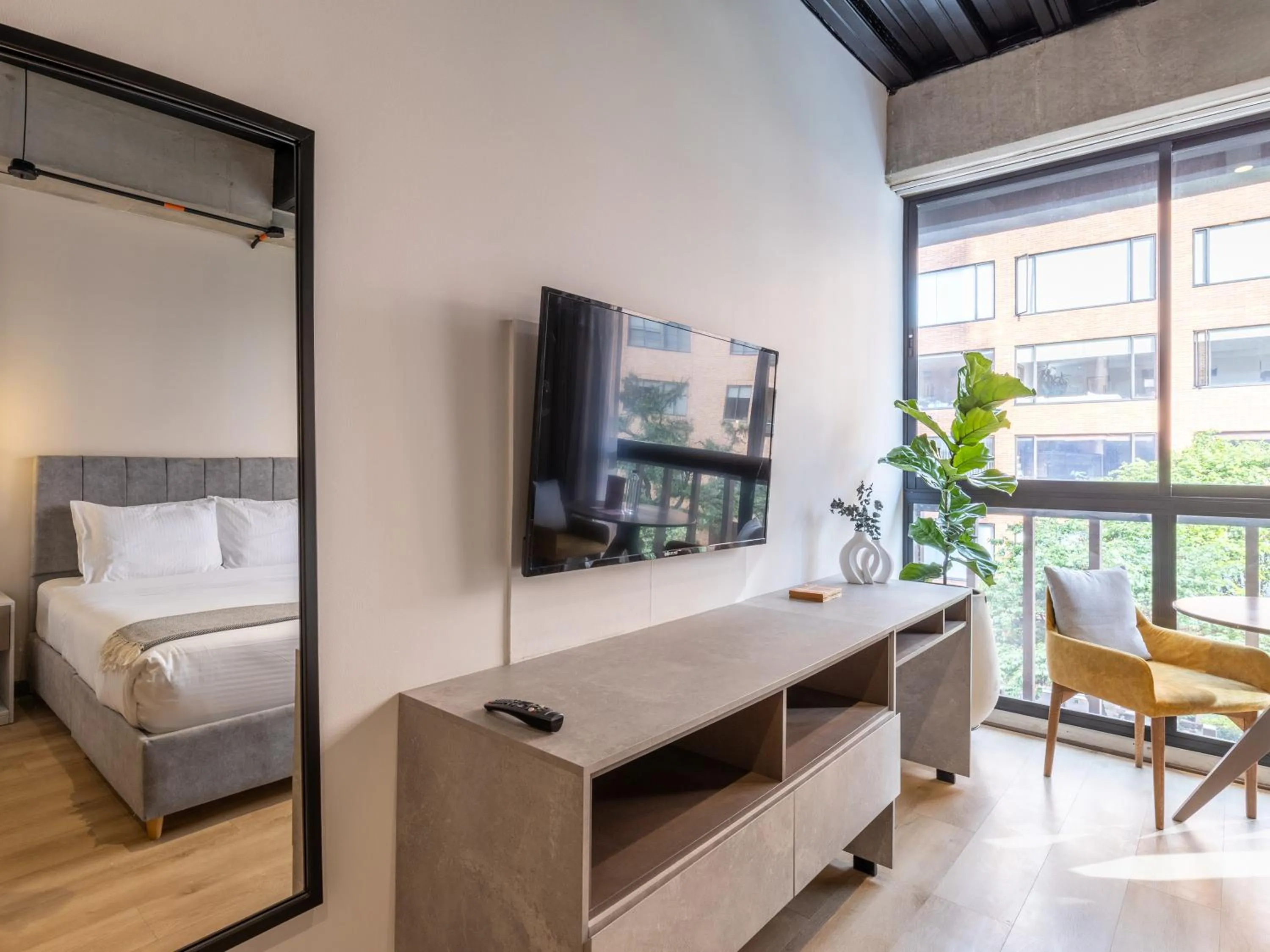 Bed in Beliving by Wynwood House