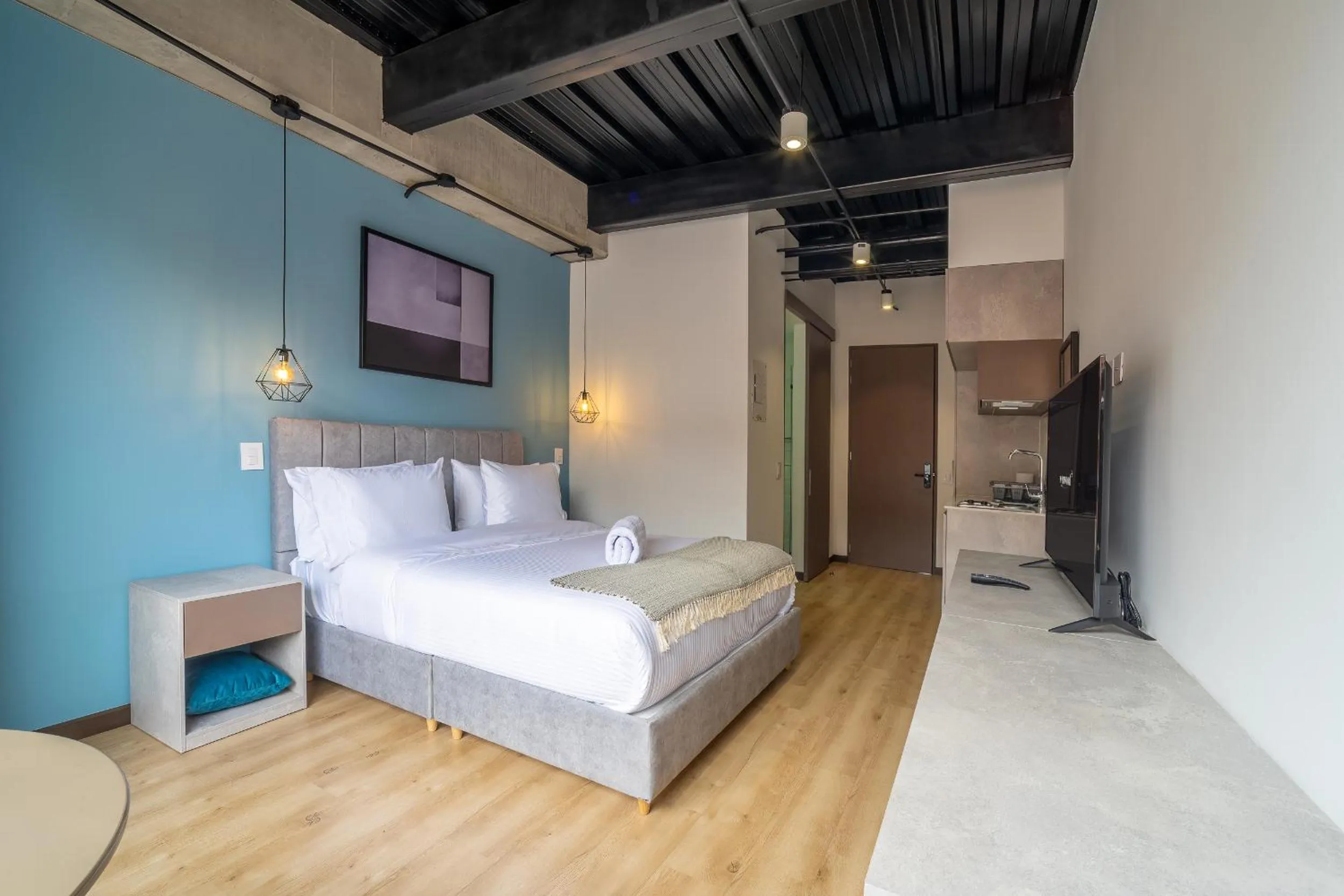 Bed in Beliving by Wynwood House