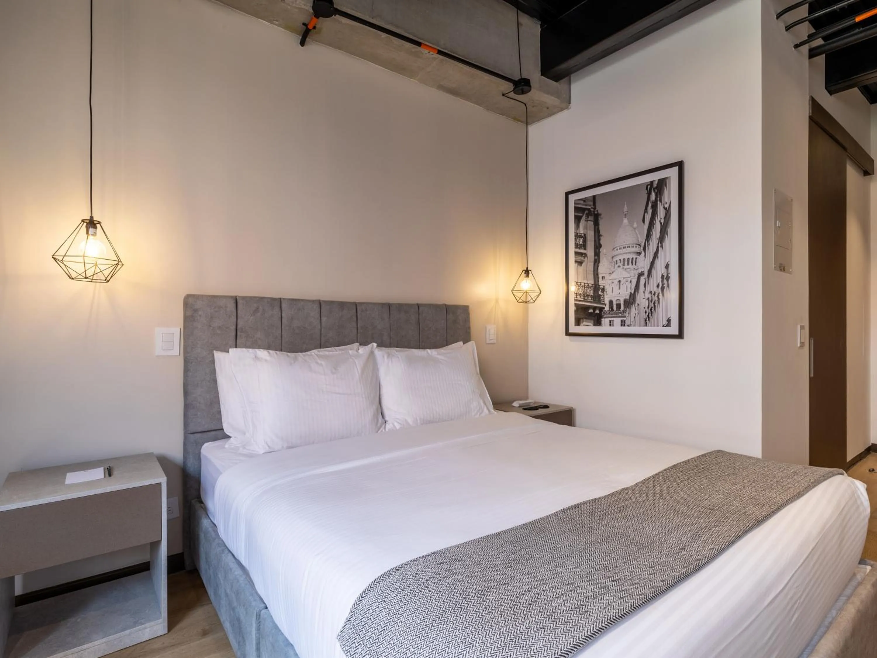 Bed in Beliving by Wynwood House