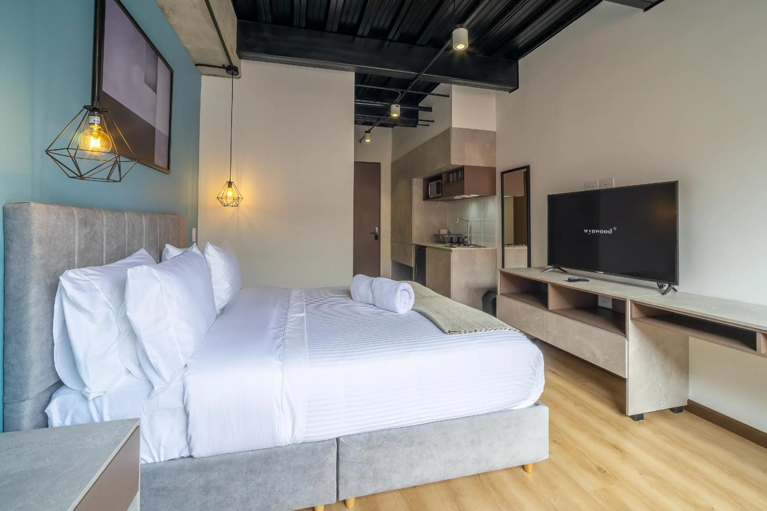 Bed in Beliving by Wynwood House