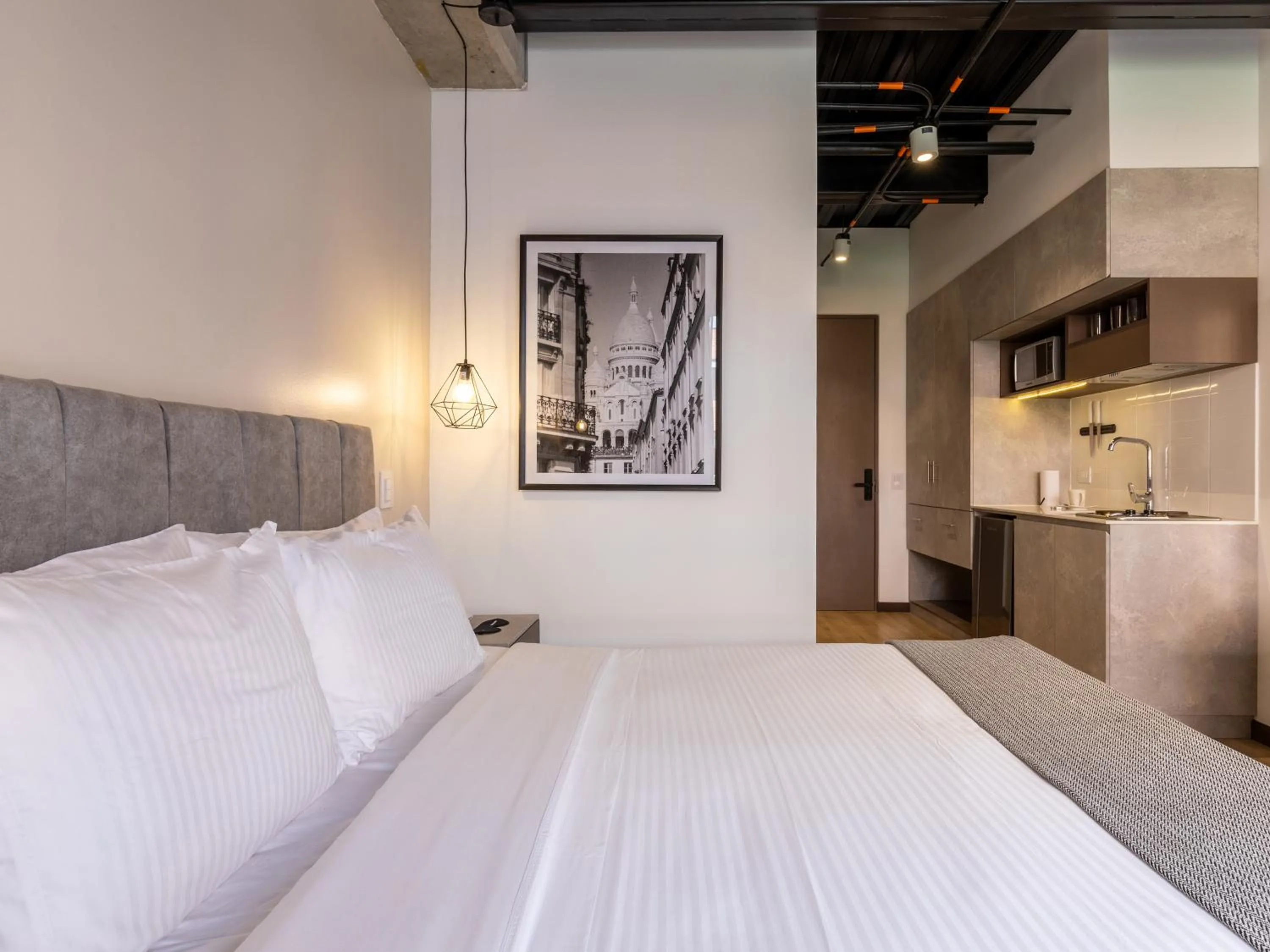 Bed in Beliving by Wynwood House