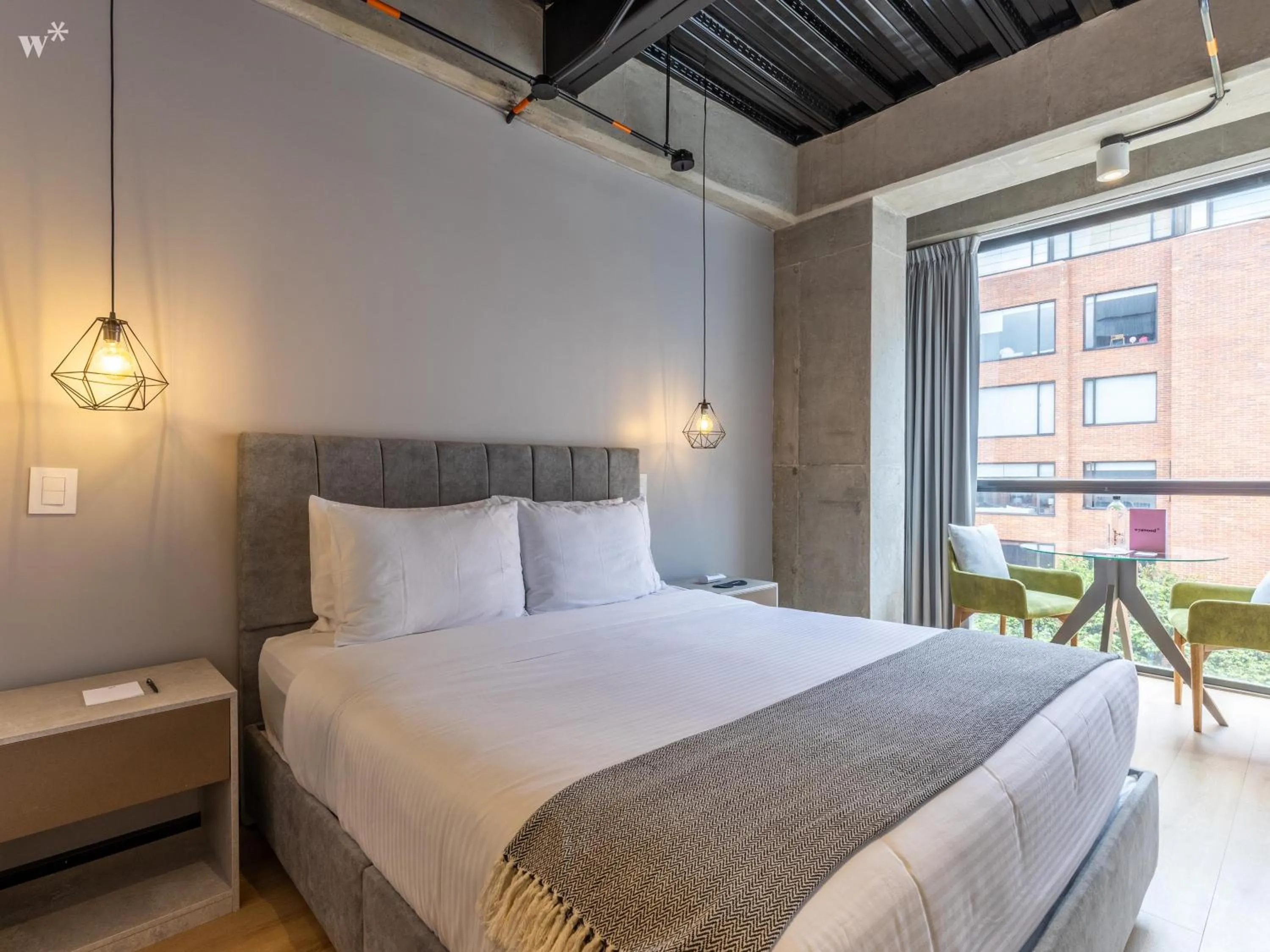 Bed in Beliving by Wynwood House