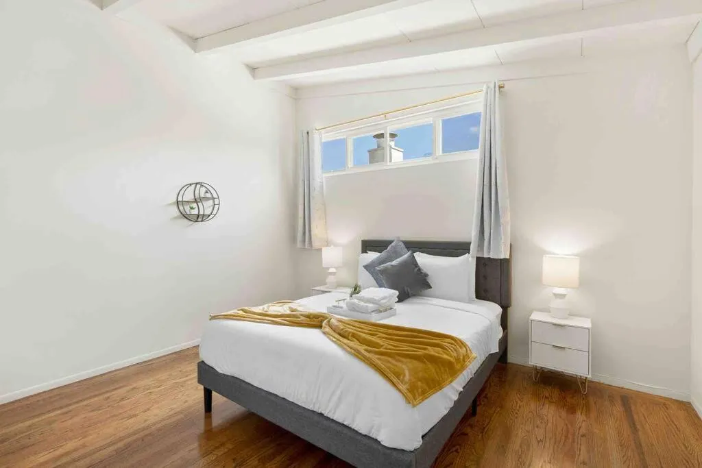 Bed in Mid Century Garden View Home Parking