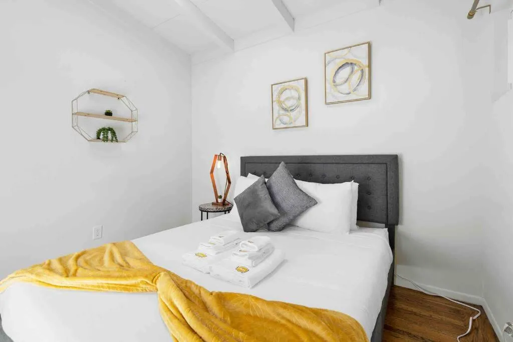 Bed in Mid Century Garden View Home Parking