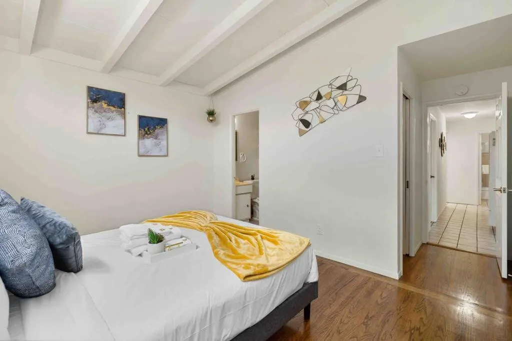 Bed in Mid Century Garden View Home Parking