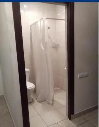 Toilet in Comfort House Hotel