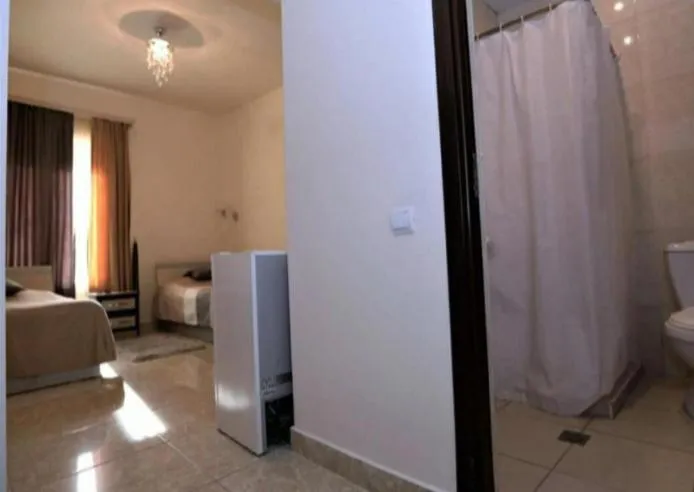 Toilet, Bed in Comfort House Hotel