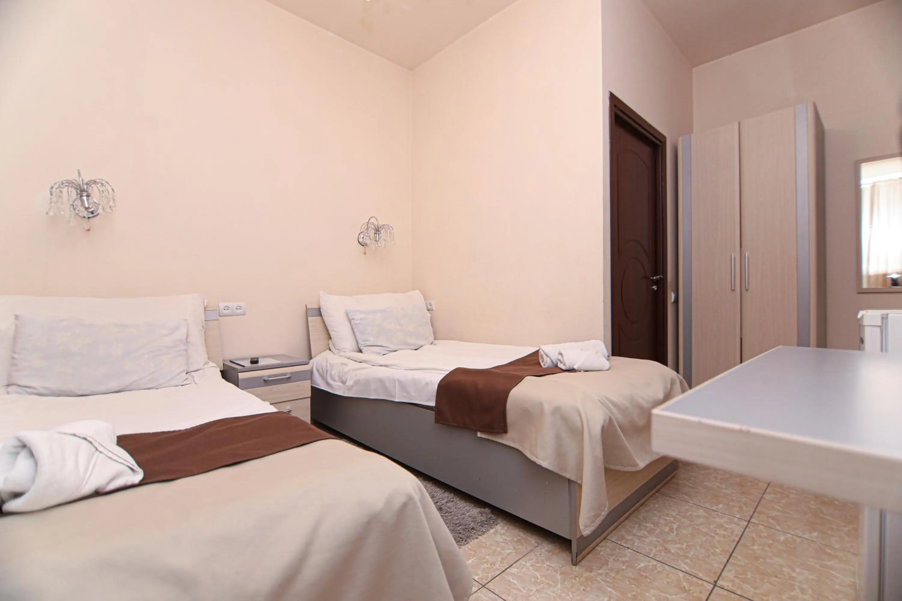 Bed in Comfort House Hotel